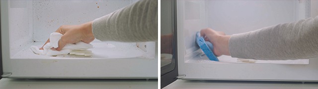 Hand wiping out microwave with paper towel and hand wiping inside of microwave with soapy sponge