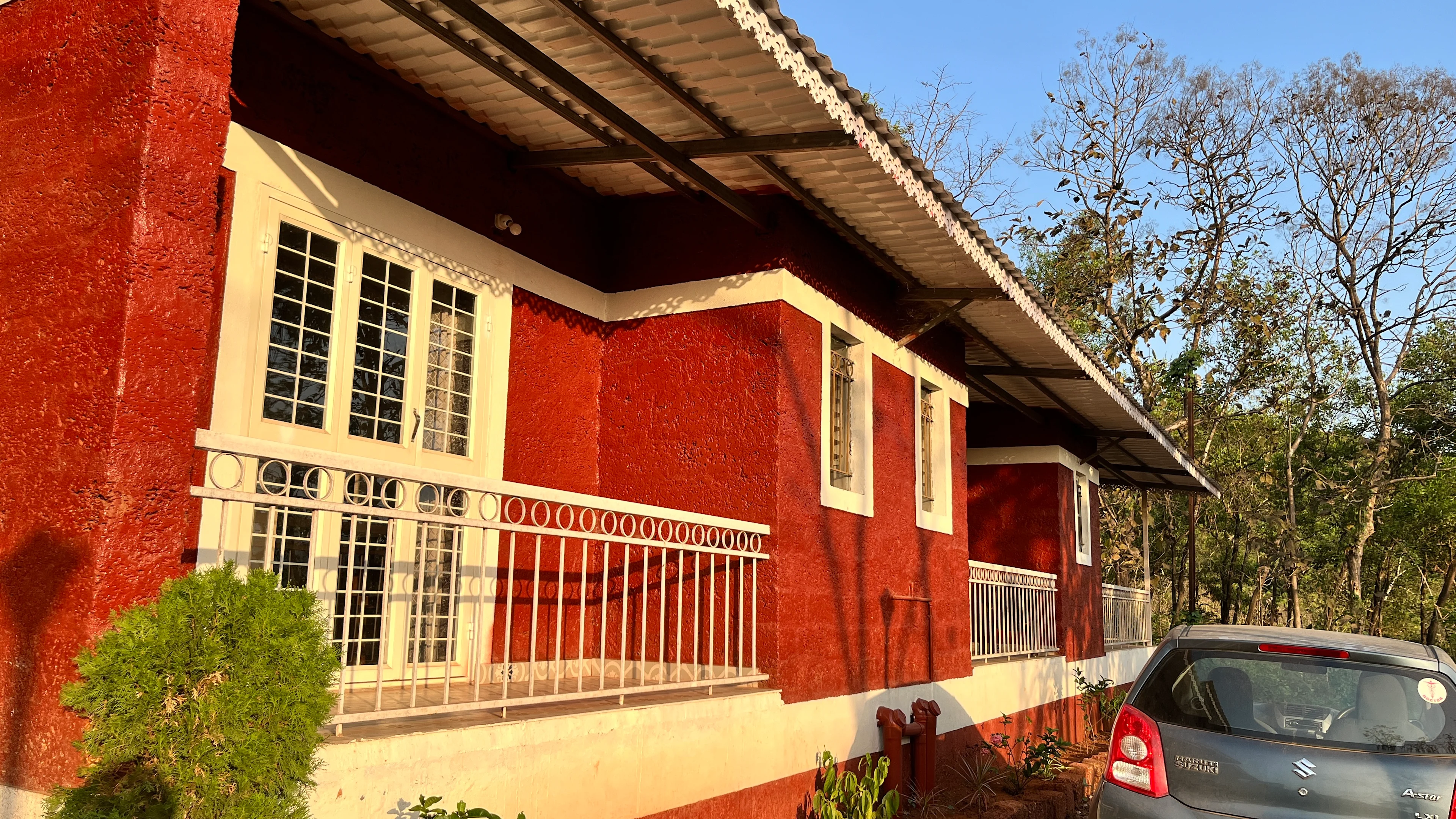 Guest rooms at Blossom Retreat — 5 bedrooms available for families, couples, and solo travelers in Chiplun, Maharashtra