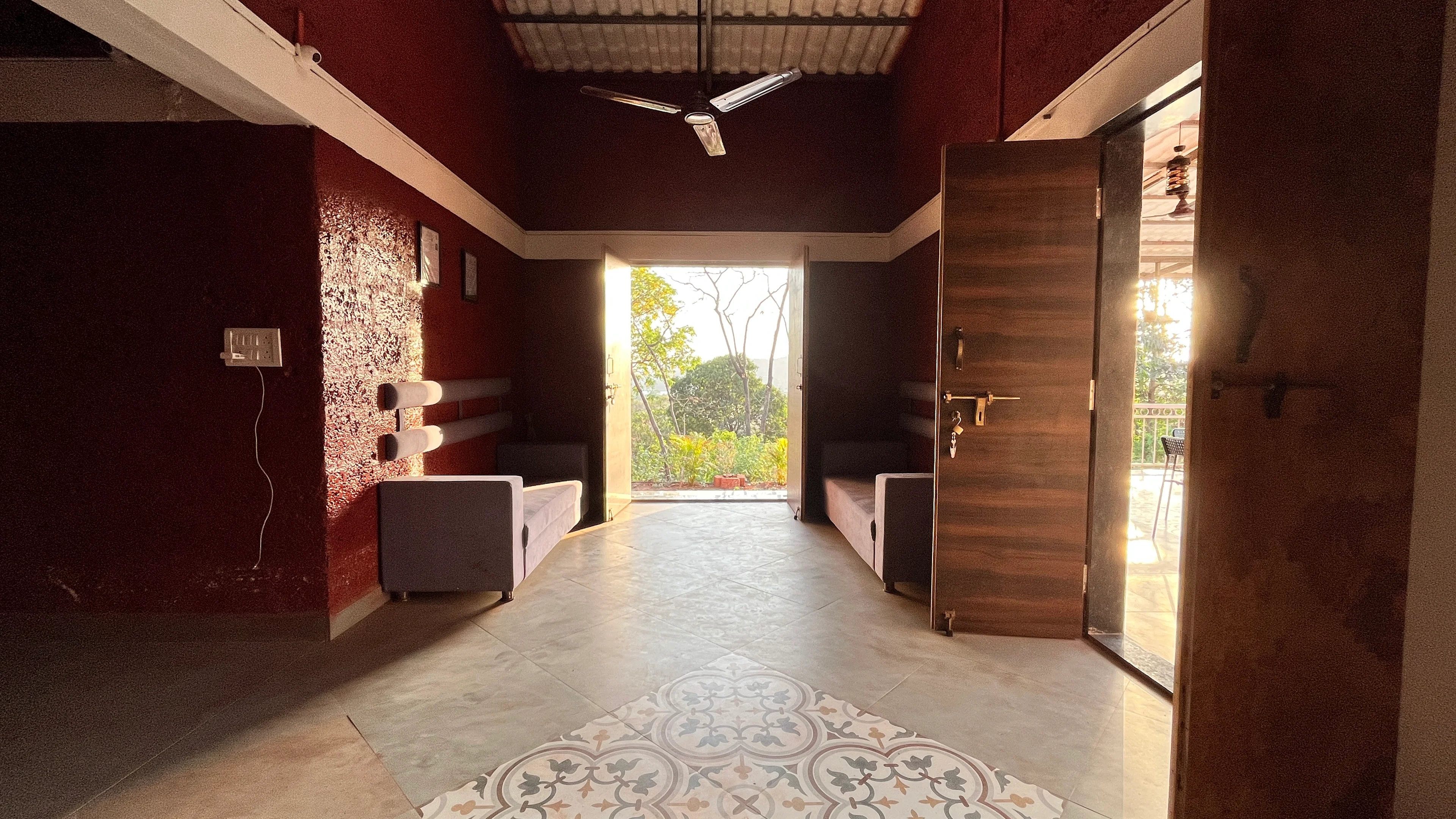 Blossom Retreat lobby — farm-fresh Konkani cuisine and communal dining at the wellness farmstay in Chiplun, Maharashtra