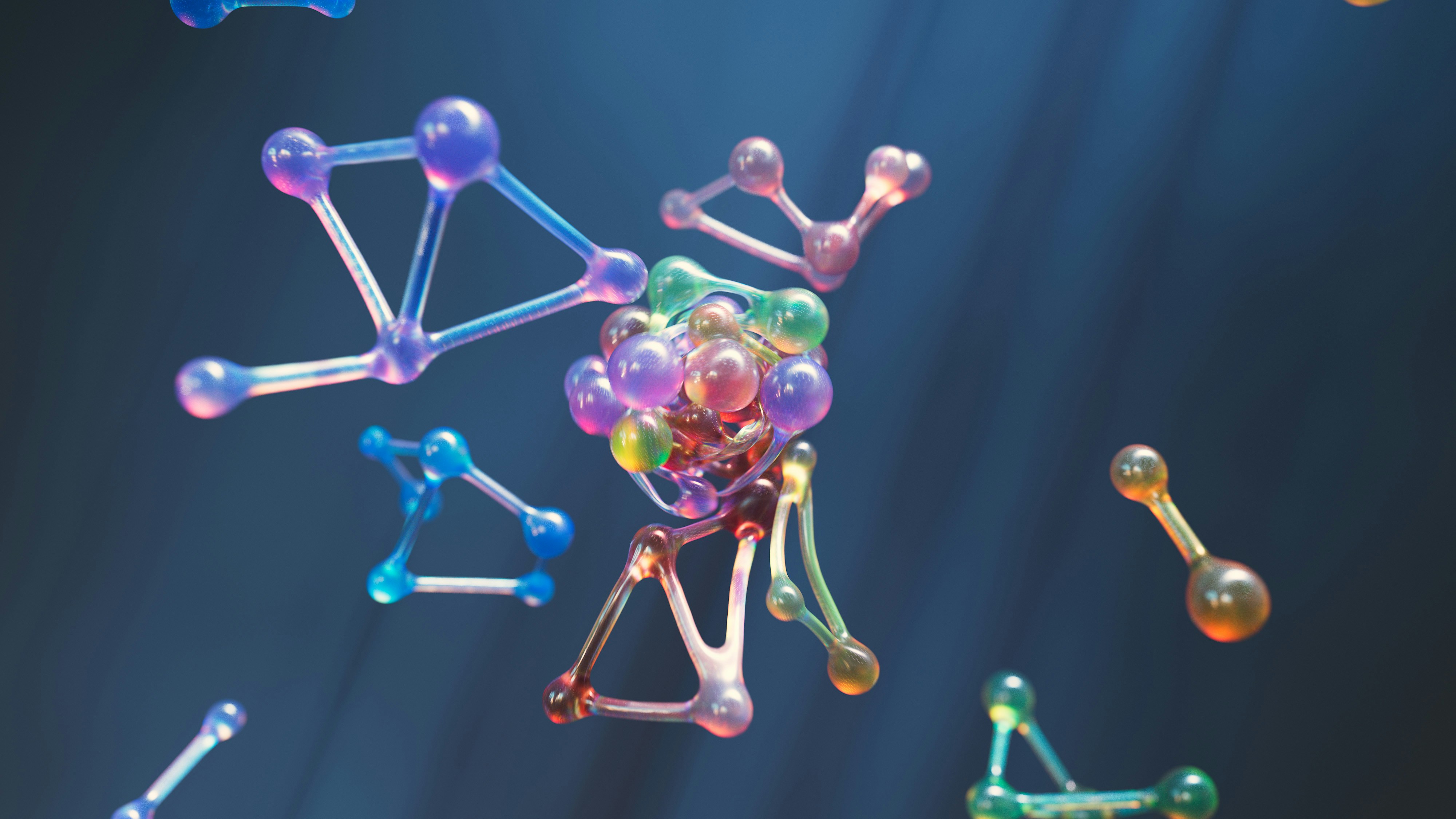 Colorful 3D molecular structures floating in space, visualising the interconnected algorithms and data networks driving generative AI search models.