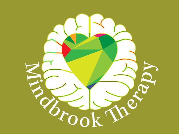 A multicolored rainbow heart sits within a white brain outline, with teal “Mindbrook Therapy” text curved beneath.