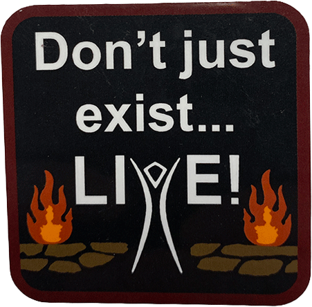 Black sticker with text “Don’t just exist… LIVE!” and a stylized figure between two campfires.