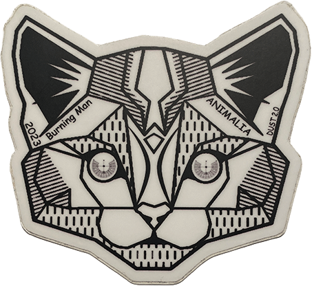 Black-and-white geometric cat face sticker with the words “Burning Man,” “Animalia,” and “2023” around the edges.
