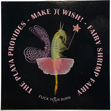 Sticker showing a fairy shrimp with wings and wand in a tutu, surrounded by text “The Playa Provides – Make a Wish – Fairy Shrimp Fairy.”