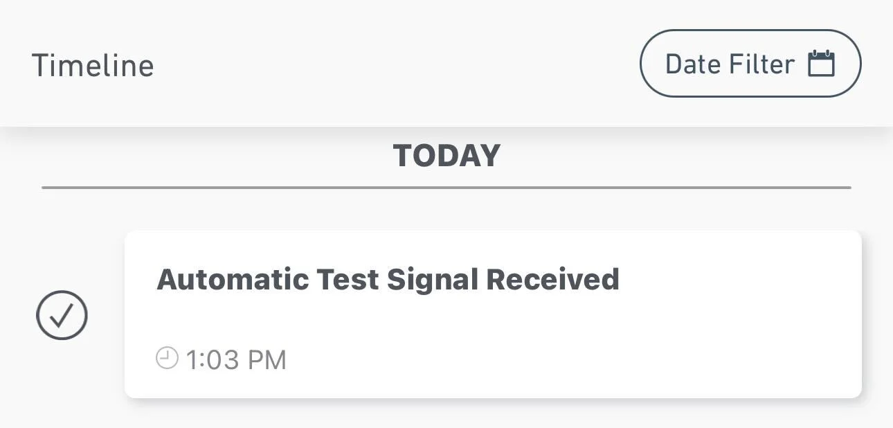 A snapshot of the Timeline within the SimpliSafe® App. The text reads, "Automatic Test Signal Received".