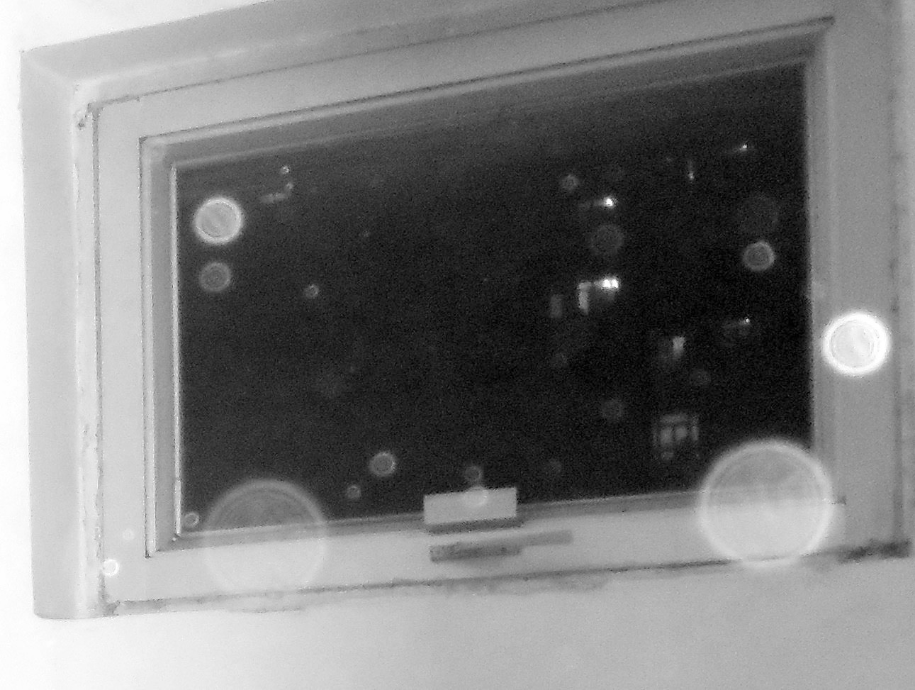 Night vision view from camera with orbs/bubbles