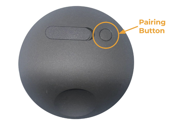 The back of the Outdoor Camera with a circle highlighting the Pairing Button