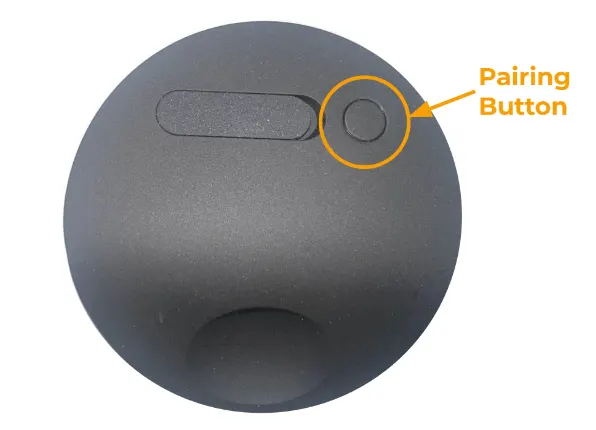 The back of the Outdoor Camera with a circle highlighting the Pairing Button