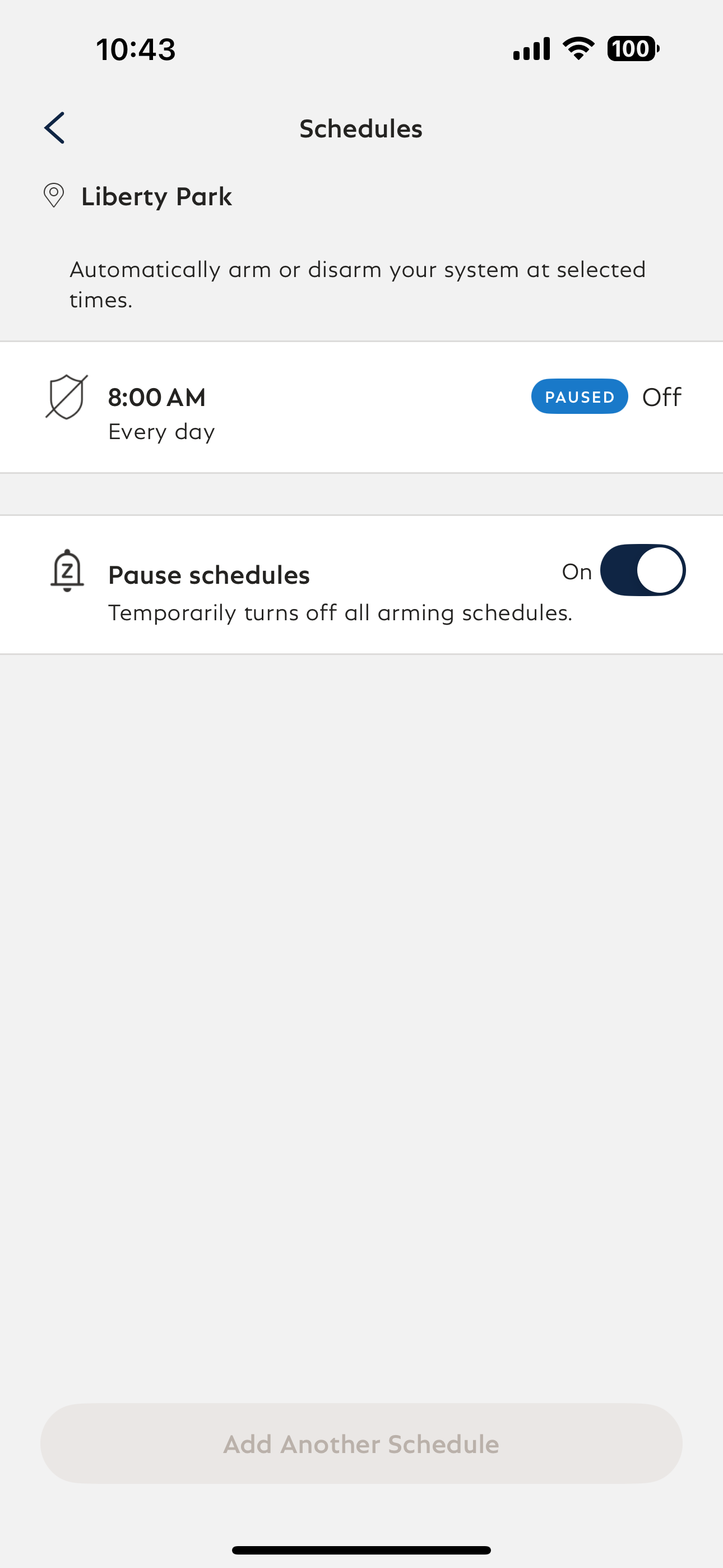 Paused Schedules toggled ON in the SimpliSafe® App. A blue banner appears next to an existing schedule that reads PAUSED.