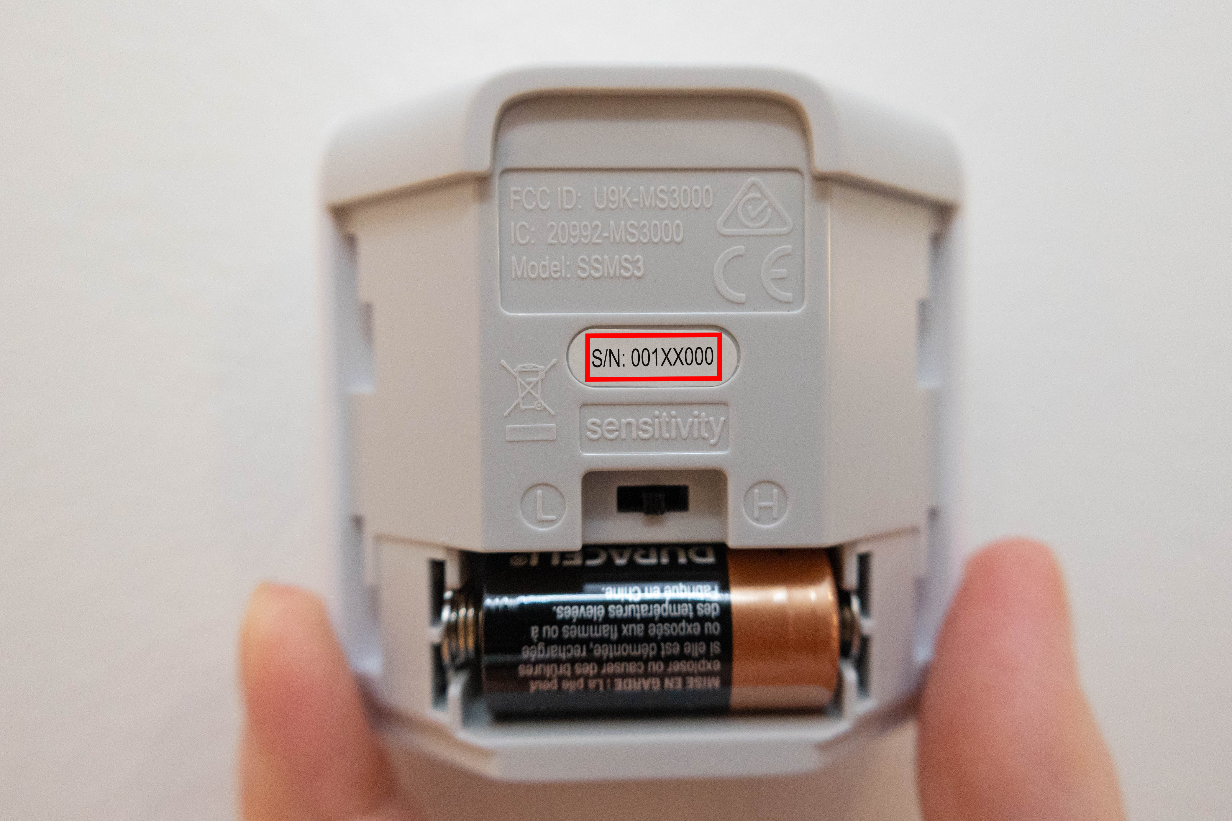 Slide the backing off the Motion Sensor Gen 1 to see the serial number