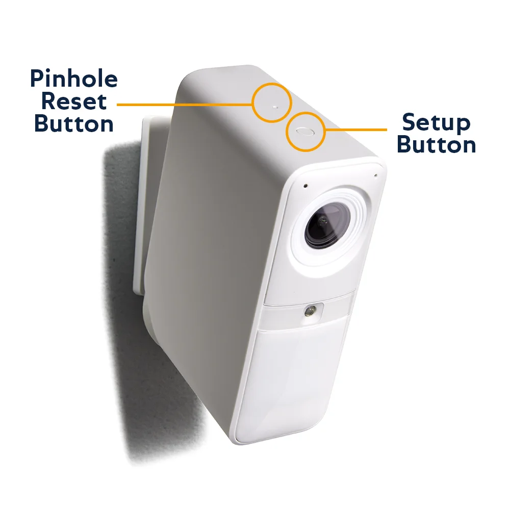 Smart Alarm Indoor Camera with pinhole reset button on top of camera, behind larger setup button.