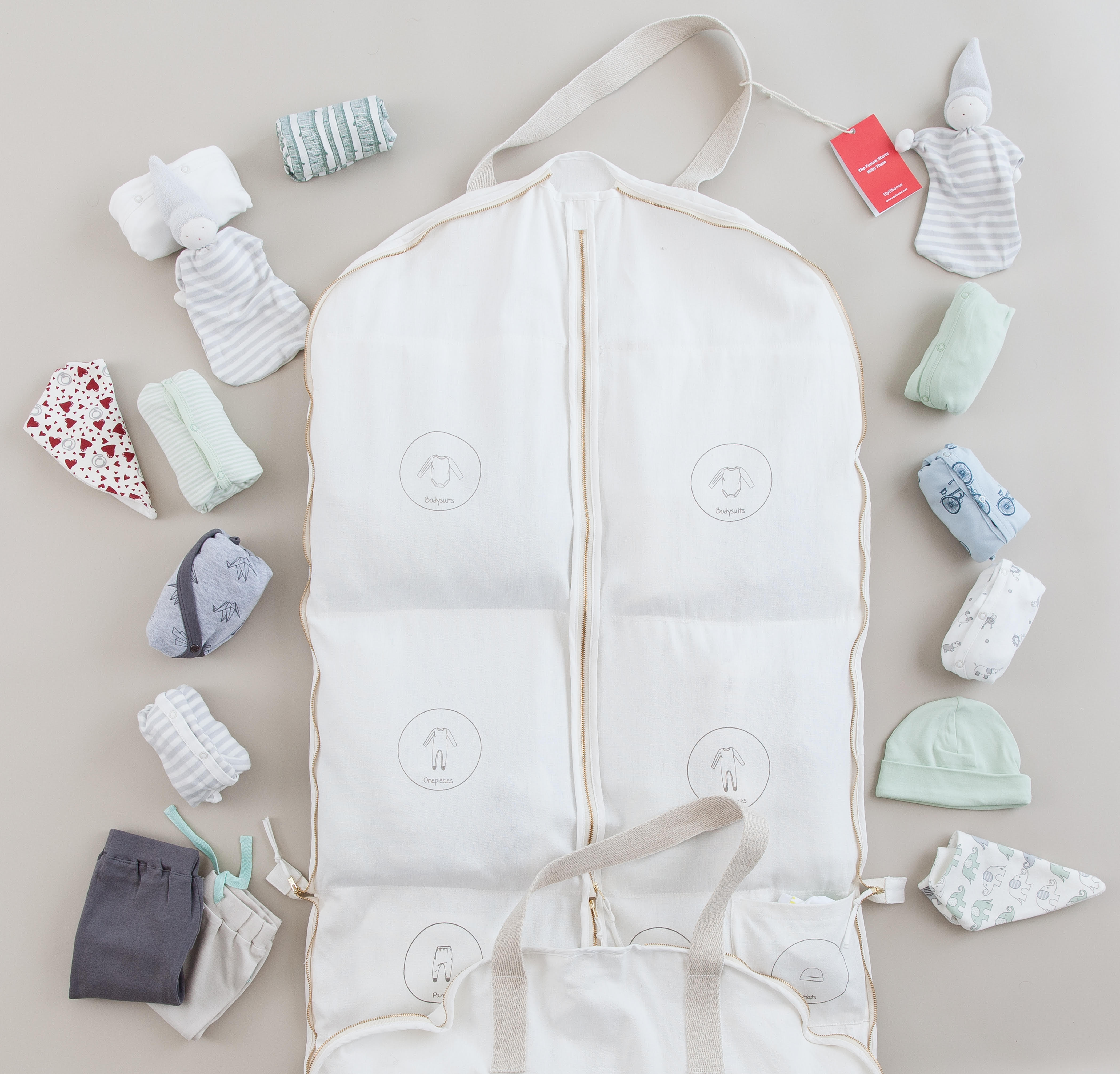 baby clothing packed into a bag