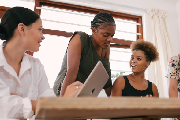 group of 3 women working together