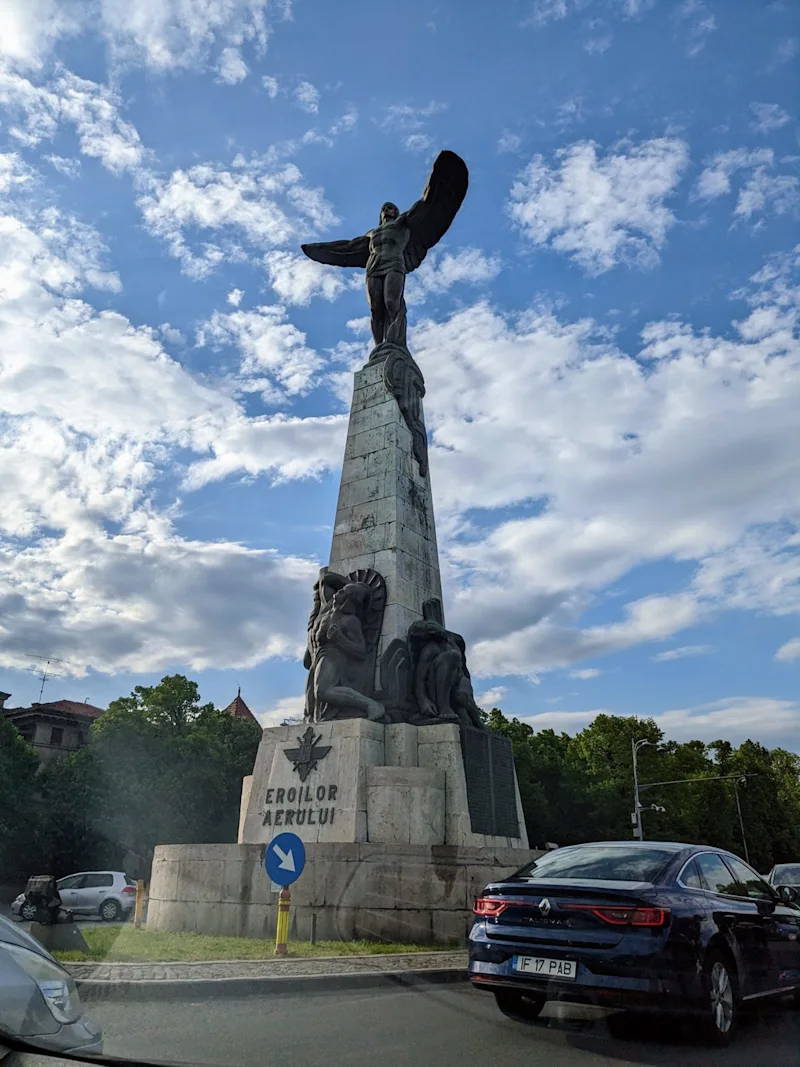Monument to the heroes of the air, a winged figure on a stone column, Bucharest