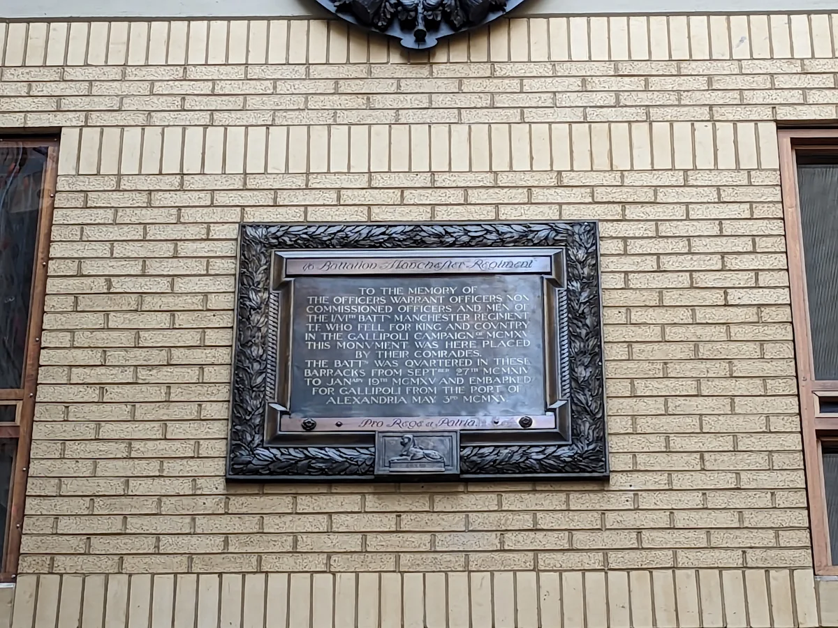 Bronze memorial plaque to the 1/6th Battalion Manchester Regiment at University Barracks, Manchester