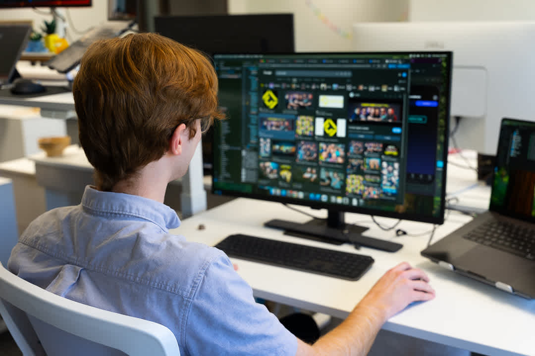 moonello-software-development-service-ethan-at-computer