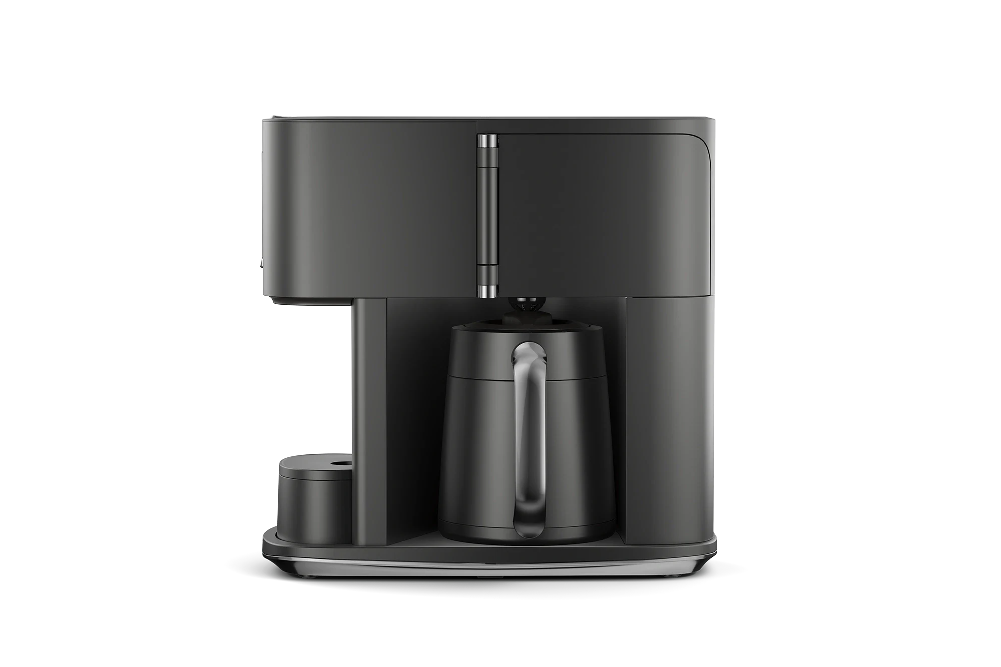 The Ritual coffee system in Obsidian in a solo product shot from the side, showing the thermal carafe housed in the single-serve brewing section