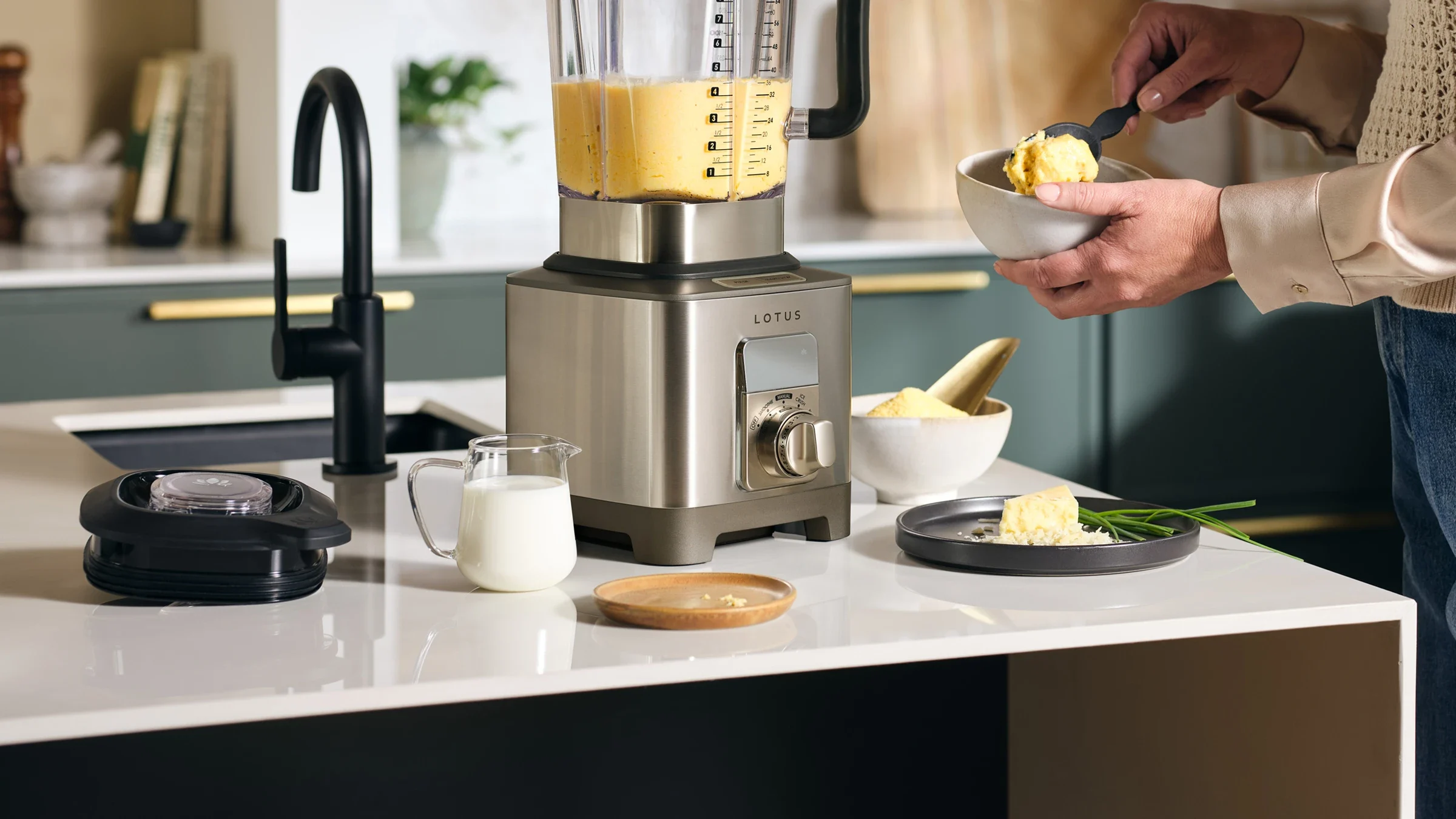 close up of a person using the power spin™ infinite speed control blender model ltsbl500