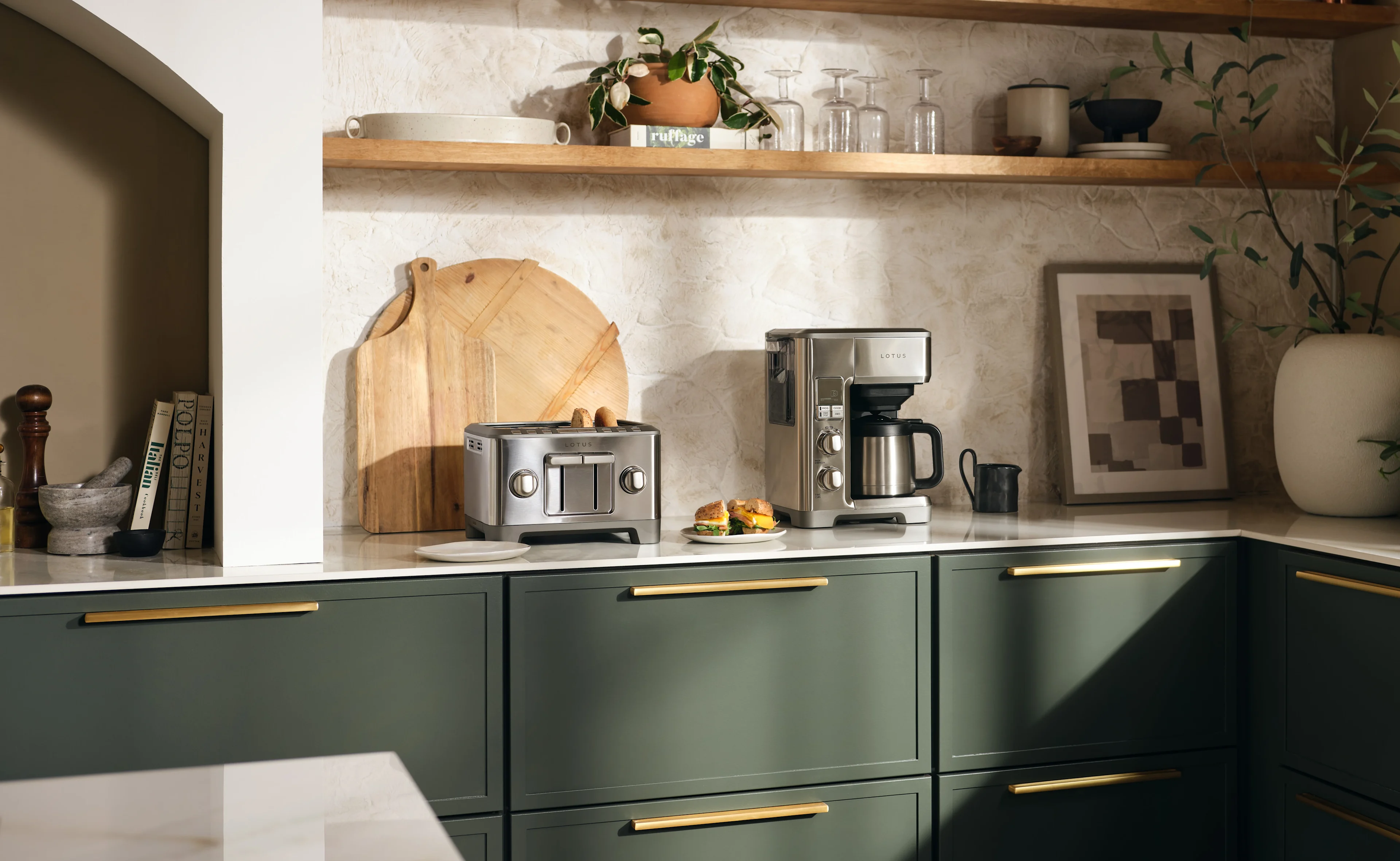 modern kitchen appliances including ltscm500 coffee maker and ltstr 504 air fry oven with stainless steel finish in sleek contemporary kitchen setup