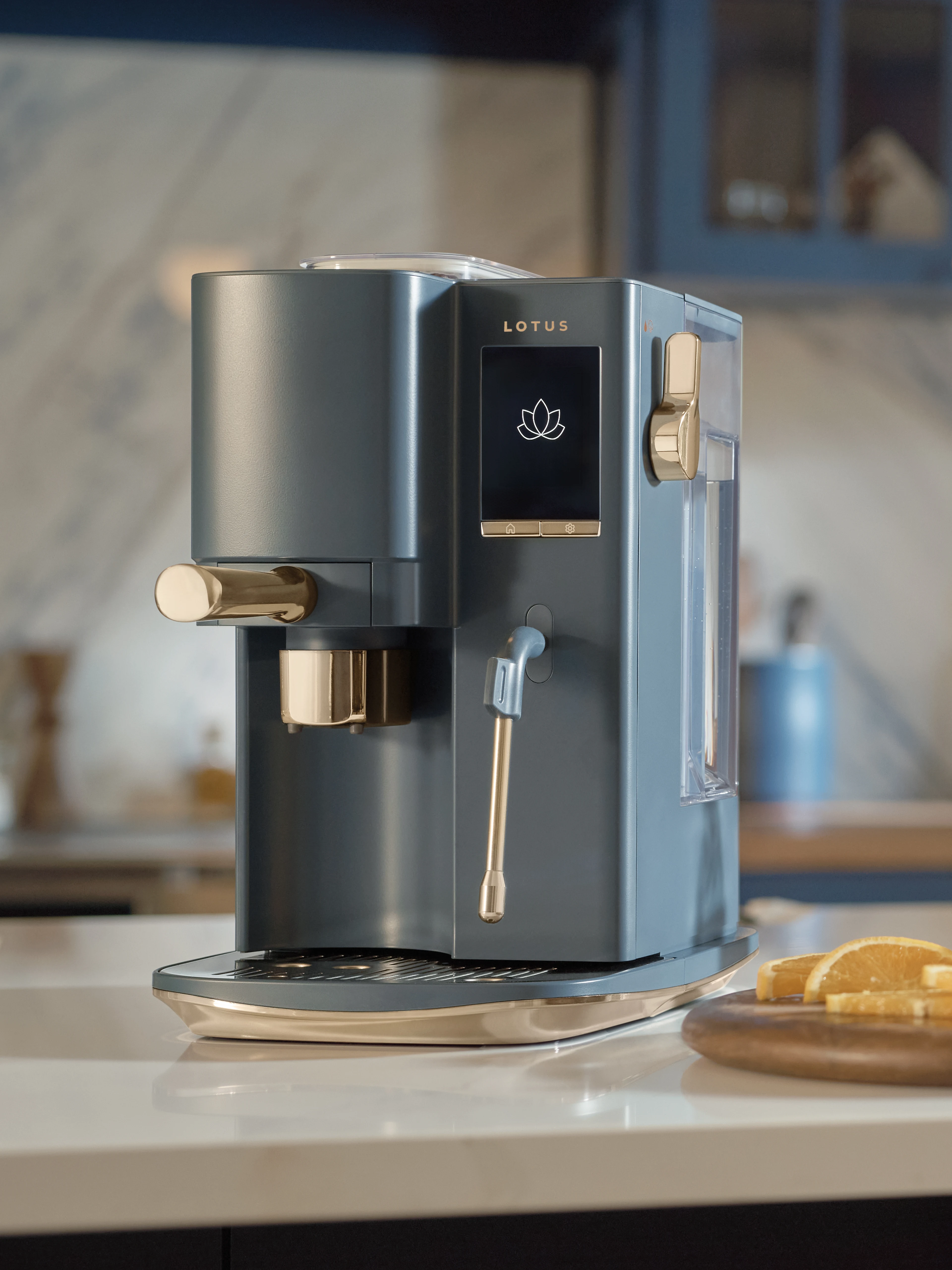 The Craft espresso machine in Bluestone, angled to show the portafilter and steam wand side
