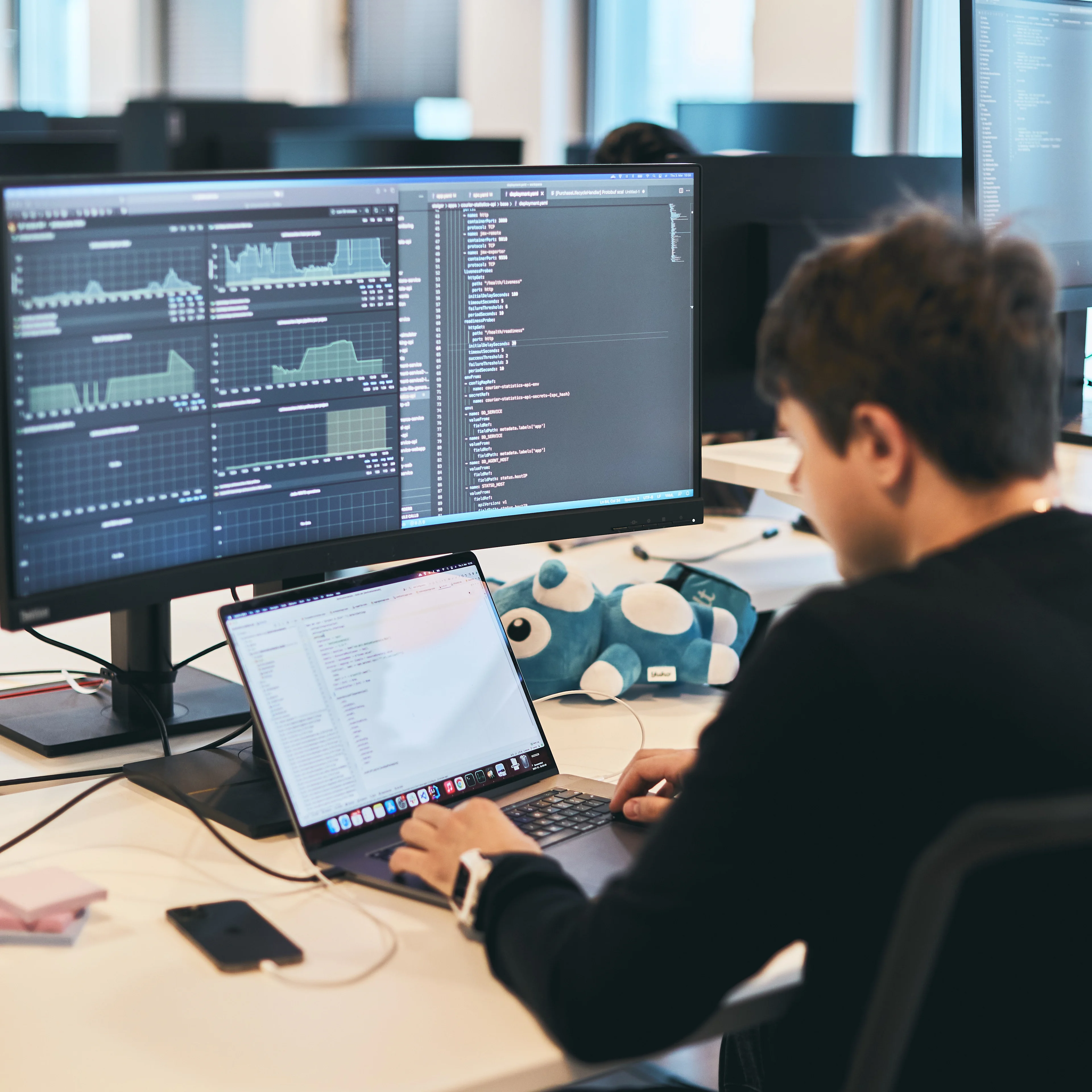 Square: coding on laptop