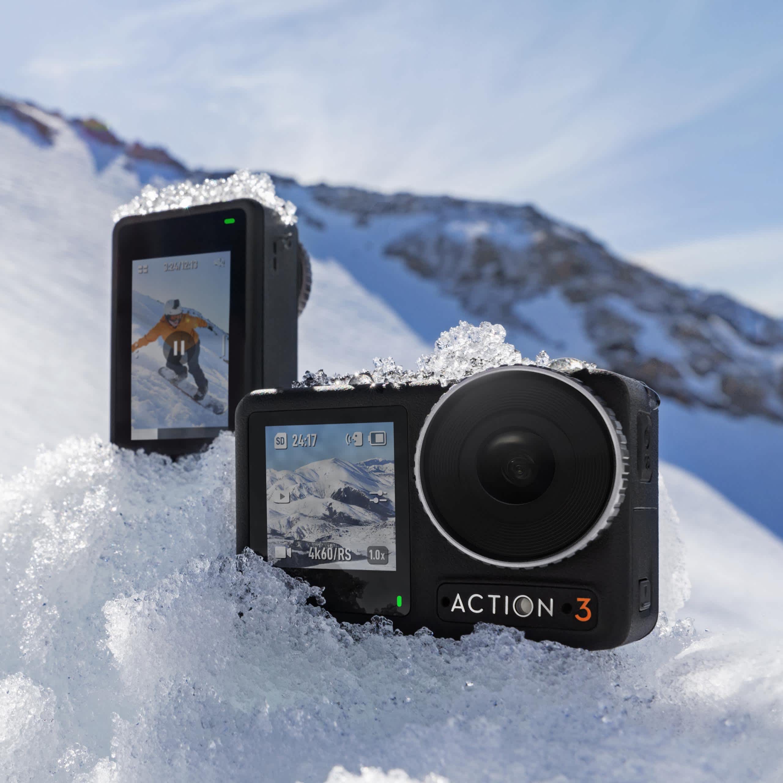 DJI Osmo Action 3 Lens Cover on a snowy hill.