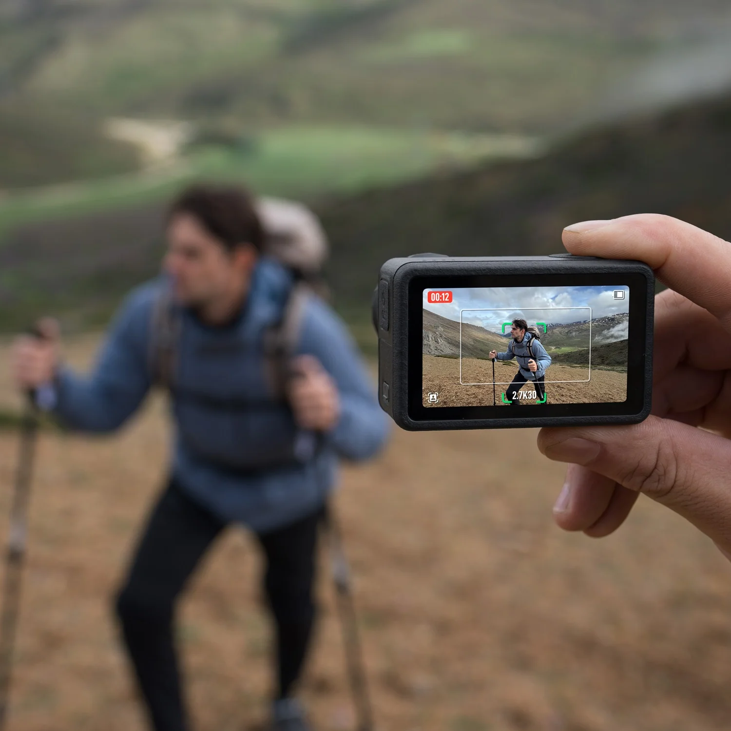 DJI Osmo Action 5 Pro filming a hiker.