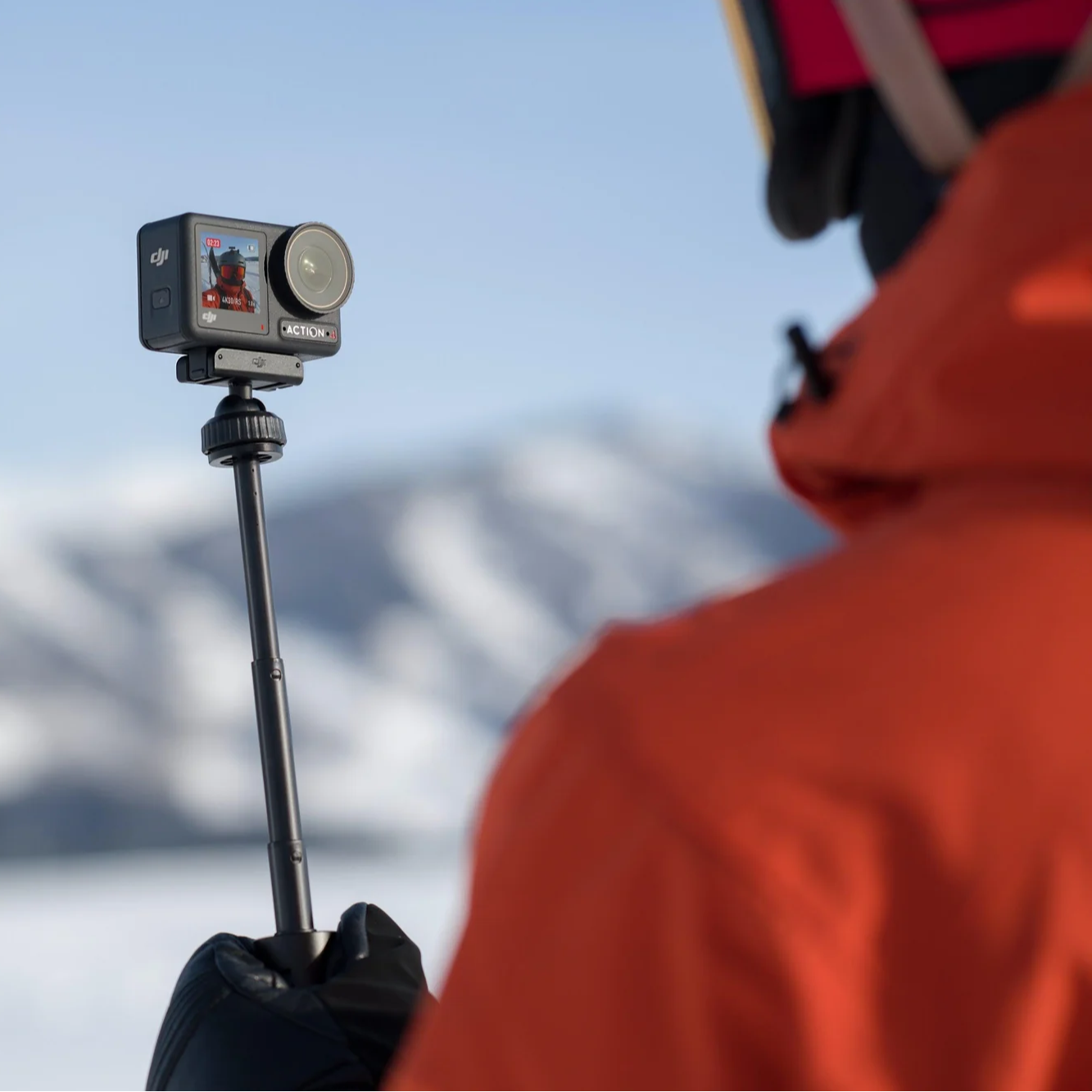 DJI Osmo Action Extension Rod in front of a white background.