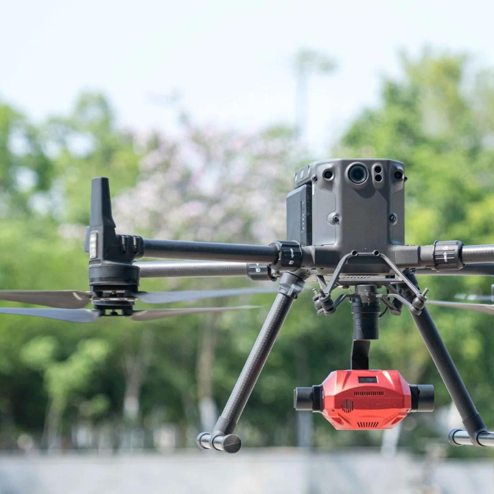 Share UAV PSDK 102S attached to a drone in flight.