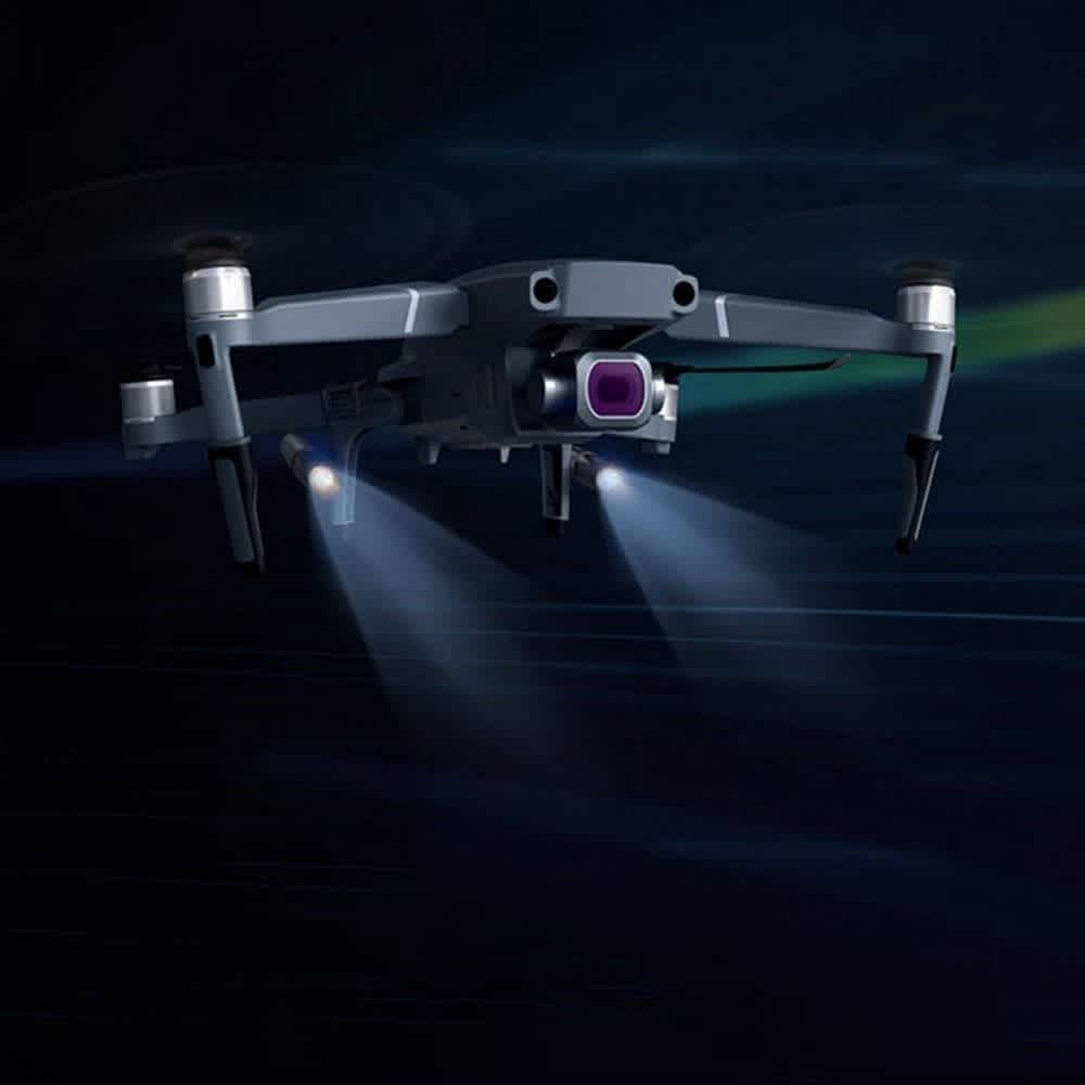 PGYTECH Landing Gear Extensions LED Headlamp Set for Mavic 2 attached to a drone in flight.