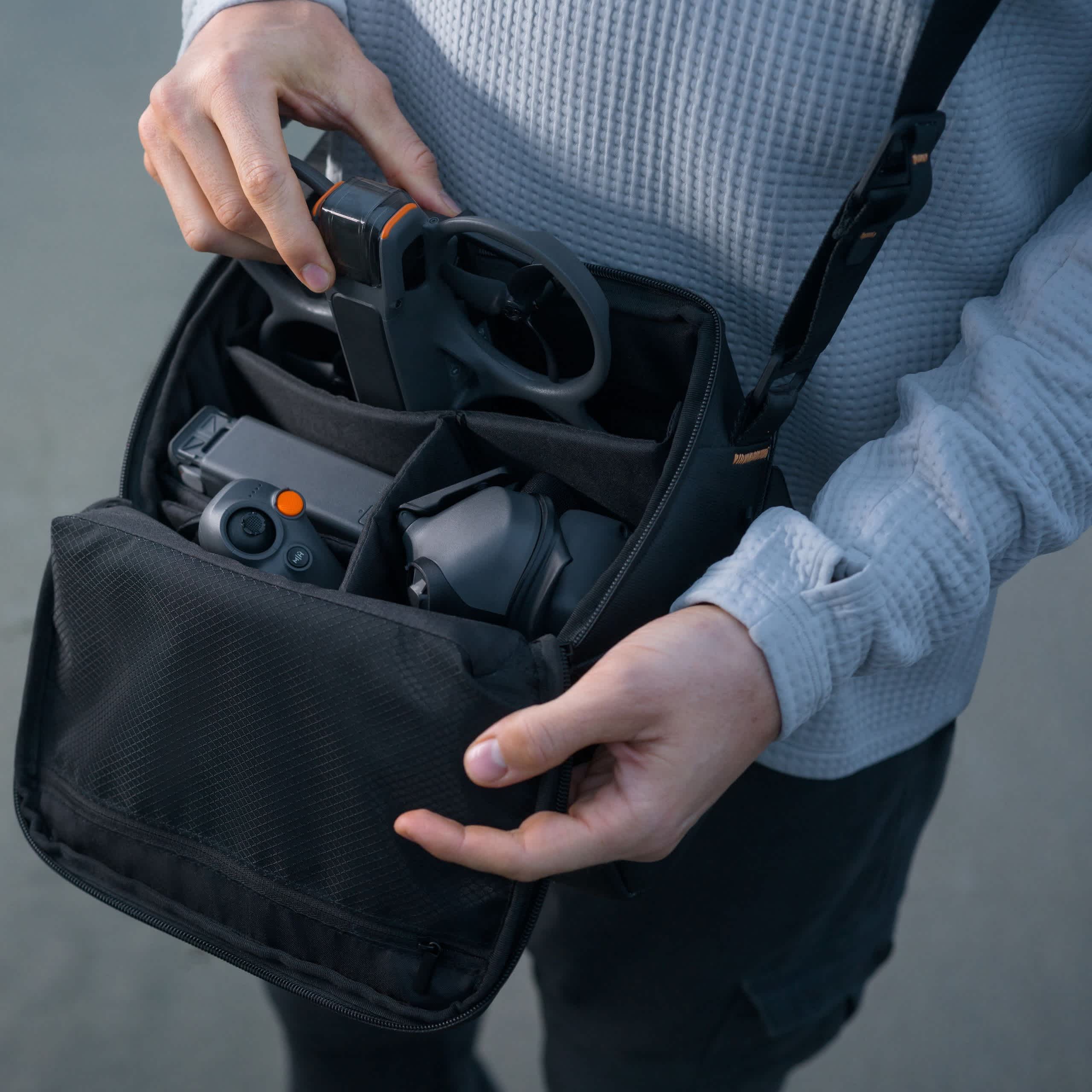 DJI Avata 2 Sling Bag, in use, displaying its storage capacity.