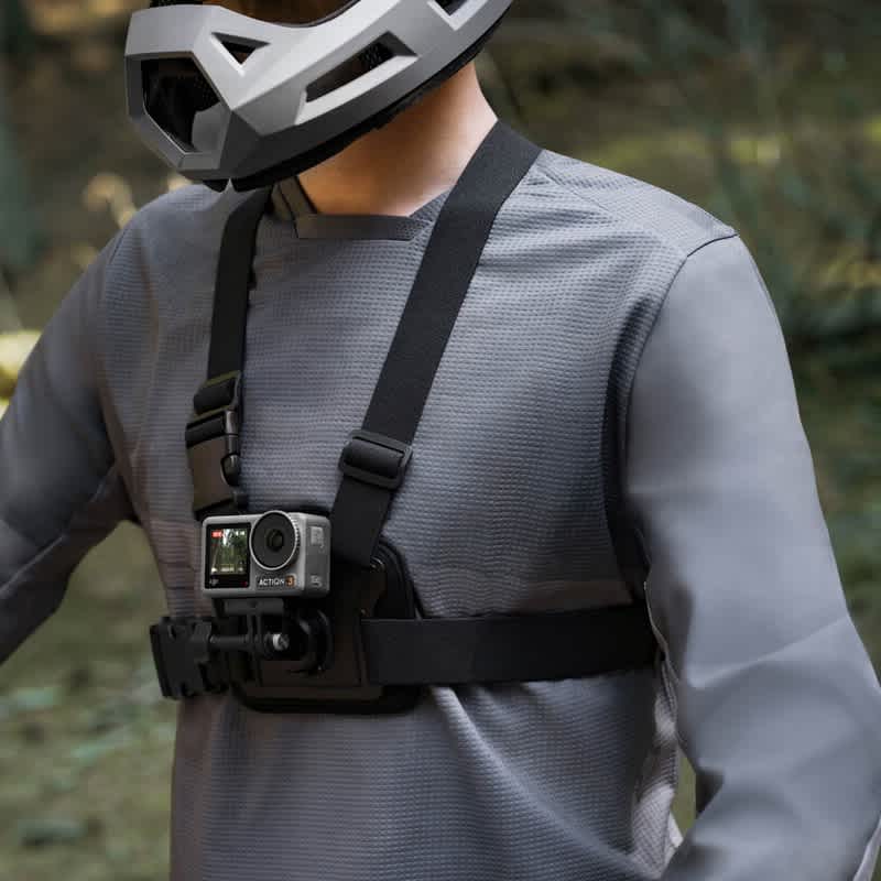 DJI Osmo Action Chest Strap Mount attached to the operator.