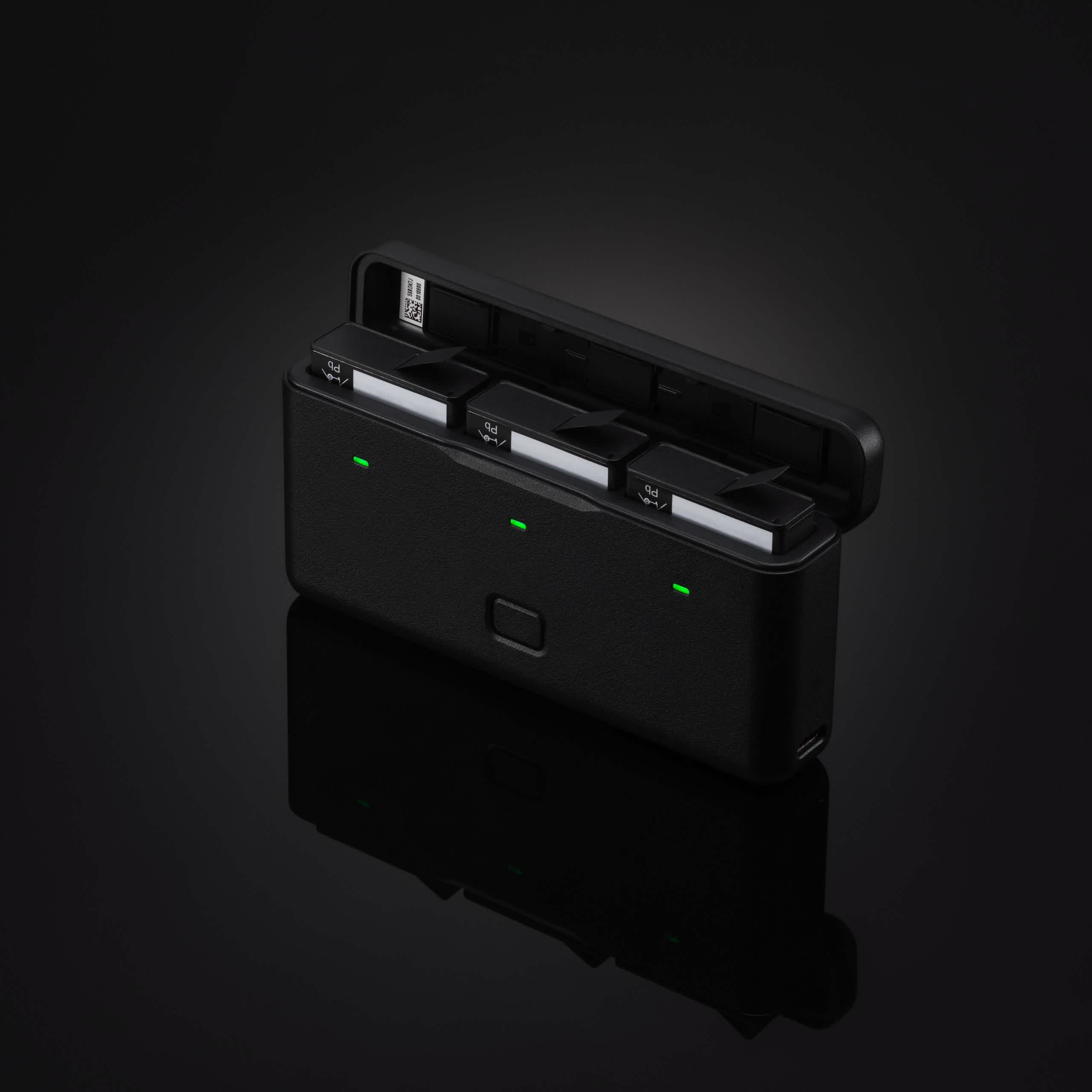 DJI Osmo Action 3 Battery Case in front of a black background.