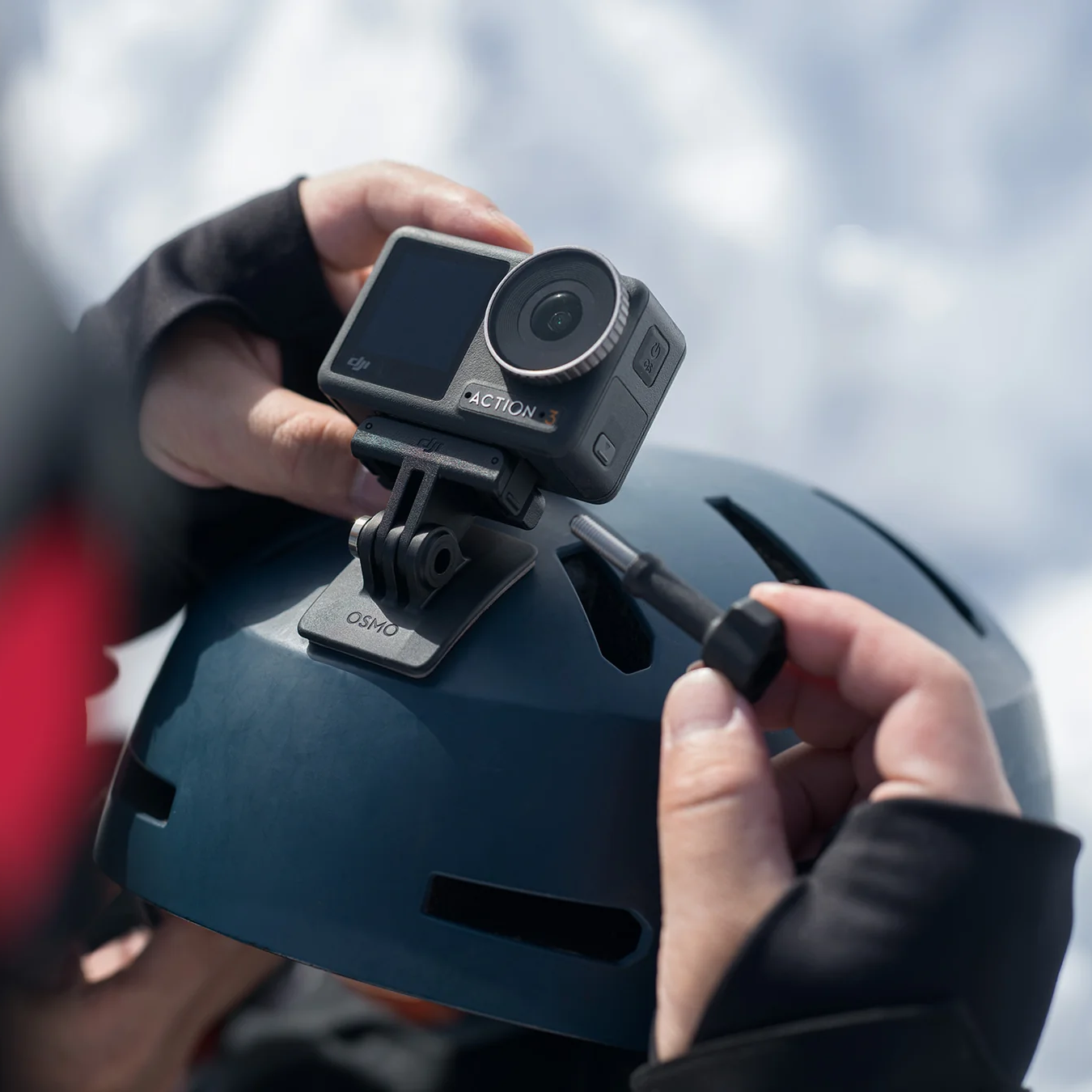 DJI Osmo Action Curved Base Kit attached to a helmet.