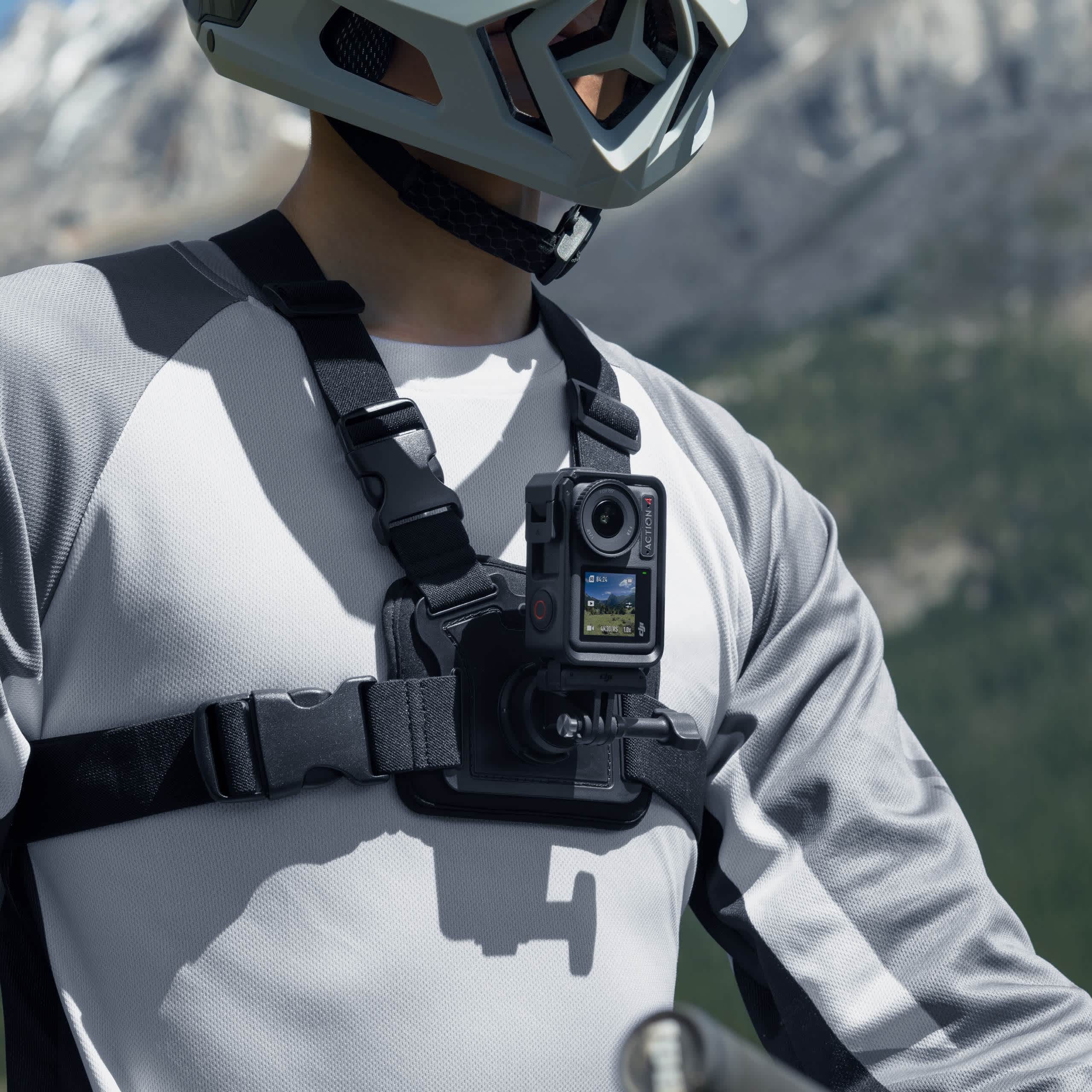 DJI Osmo Action Biking Accessory Kit strapped to bike rider.
