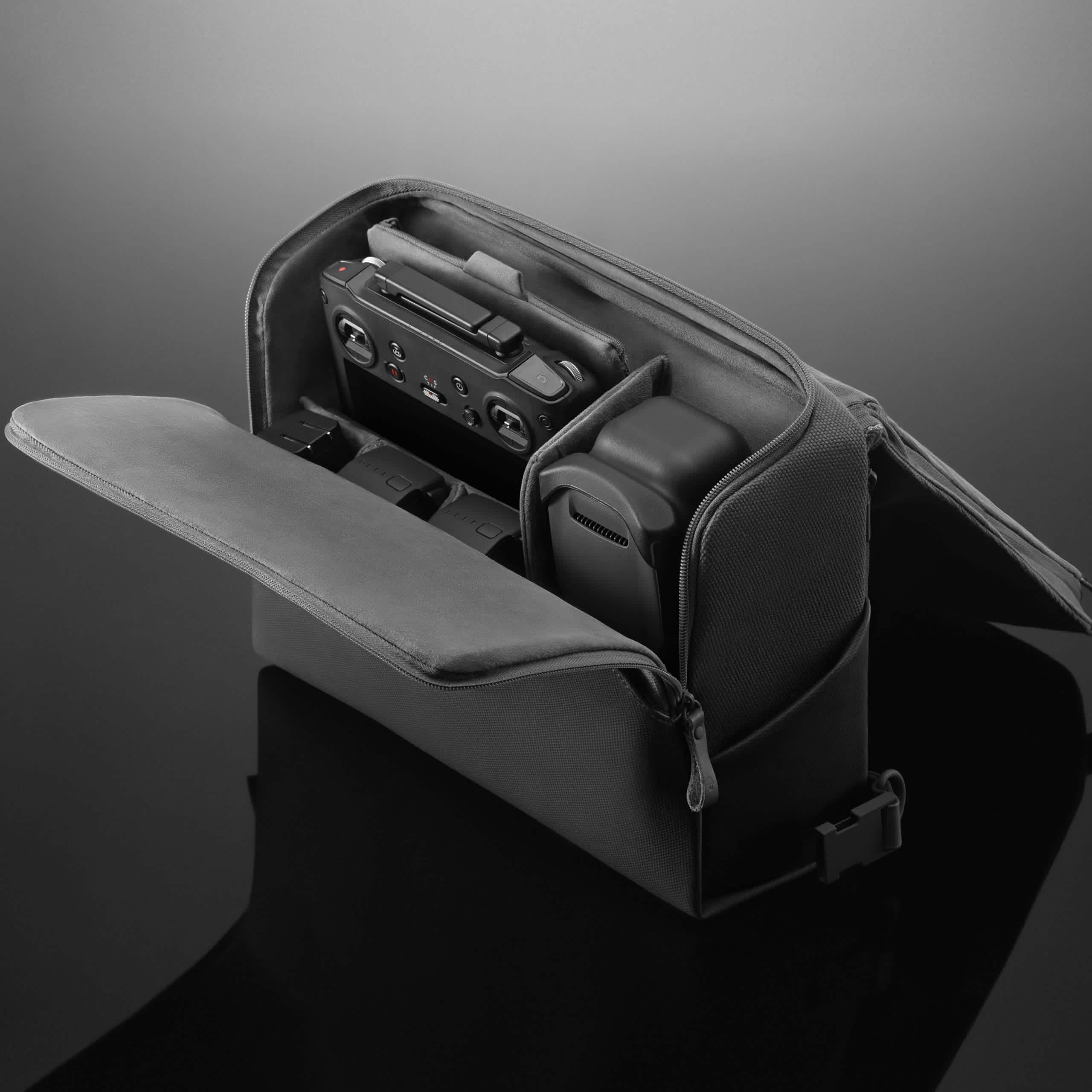 DJI Convertible Carrying Bag in front of a black background.