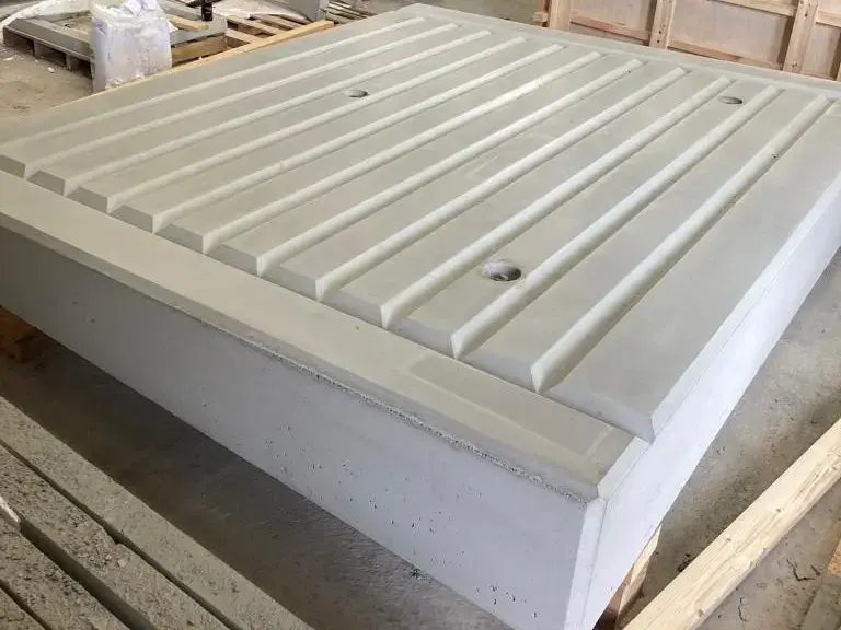 Bespoke precast concrete flying end slabs for a platform extension