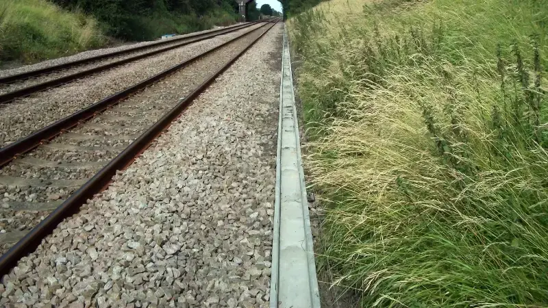 Rail cable troughs