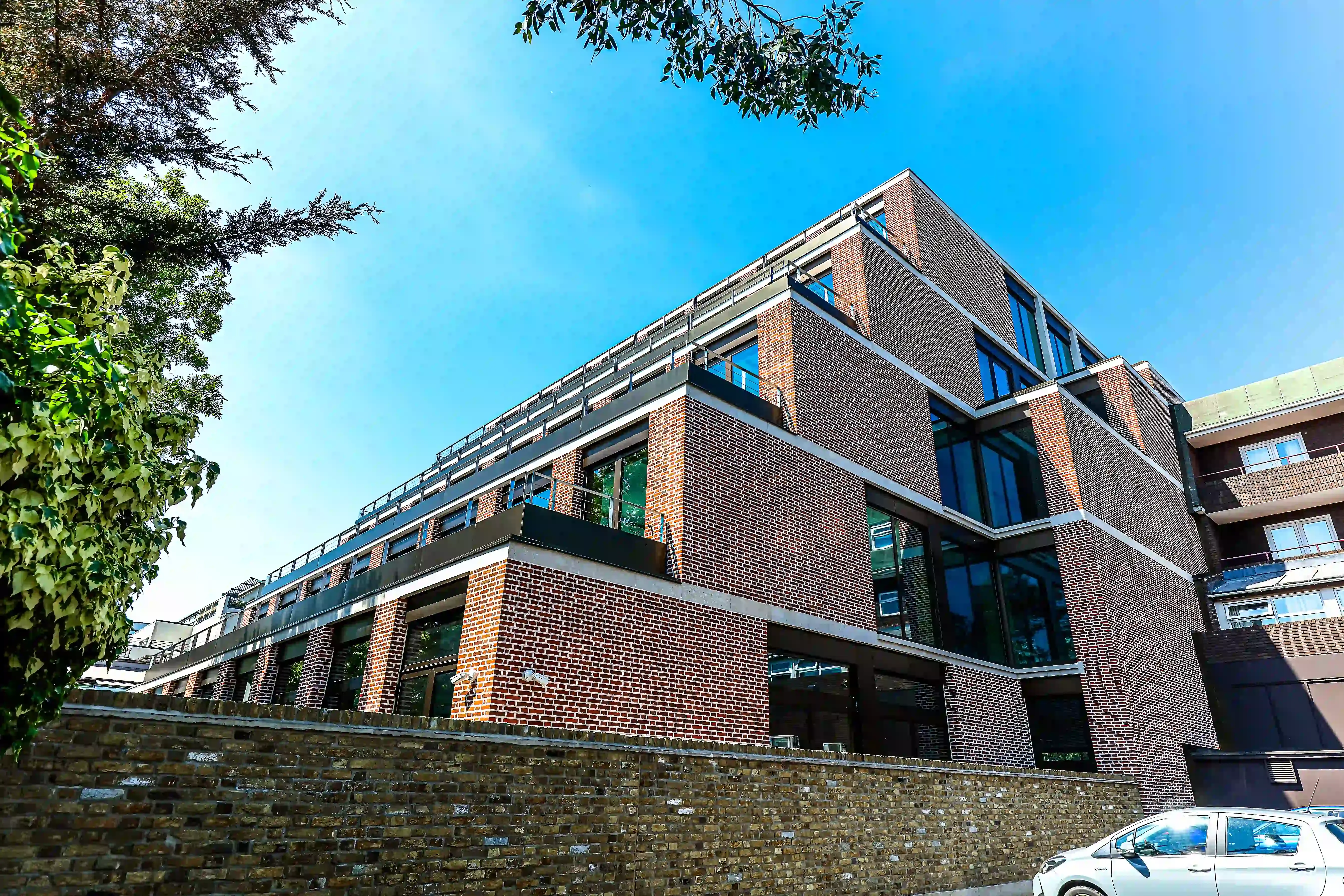 247 Wimbledon, London - Brick slips, Specials & Cast Stone, Brick type used: Swanage Handmade Light Red Multi 50mm