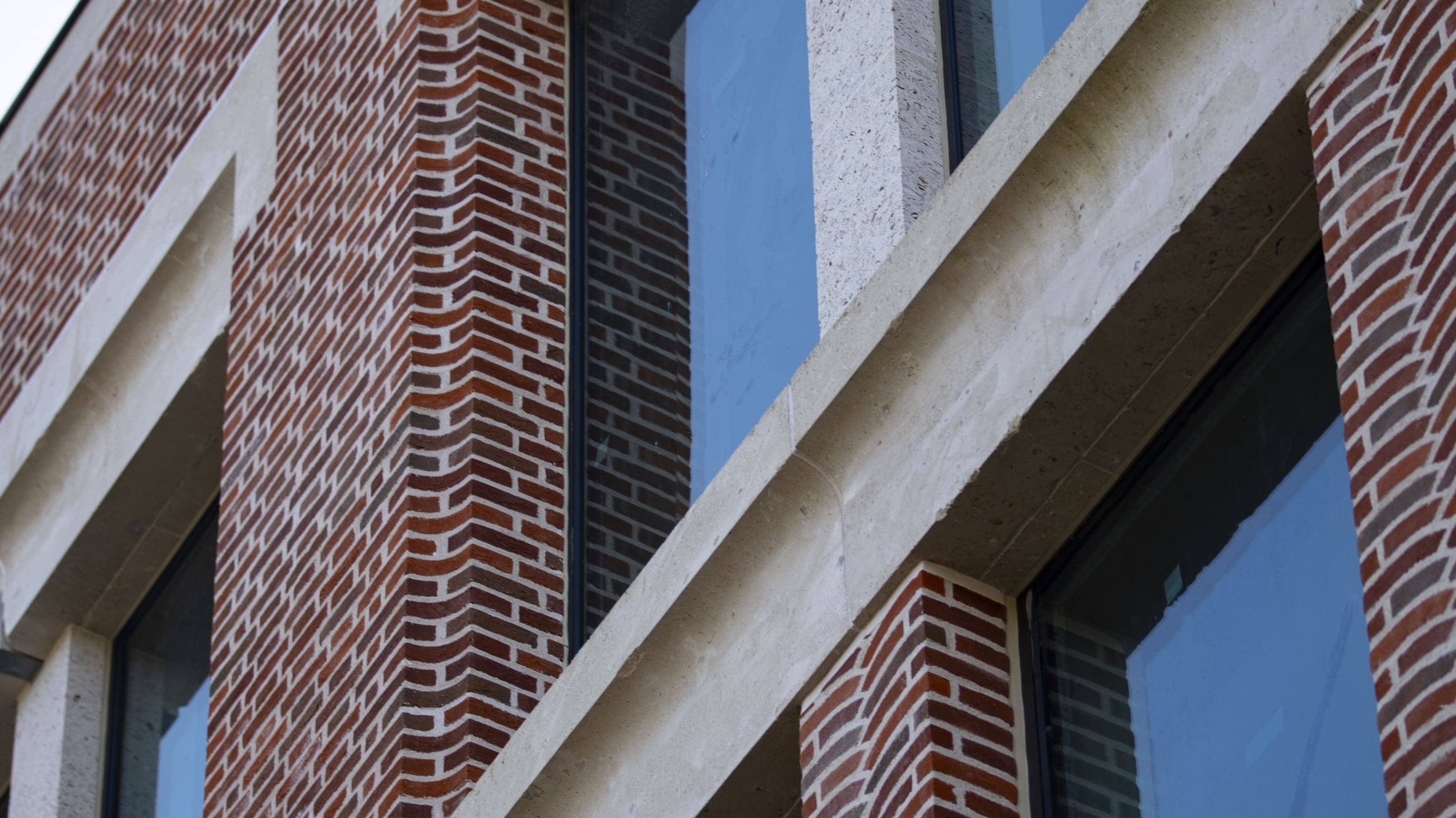 247 Wimbledon - Brick-faced GRC & Swanage handmade brick slips