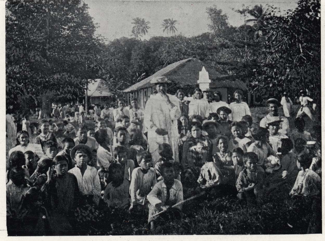 Black and white photo showing locals in Aitutaki