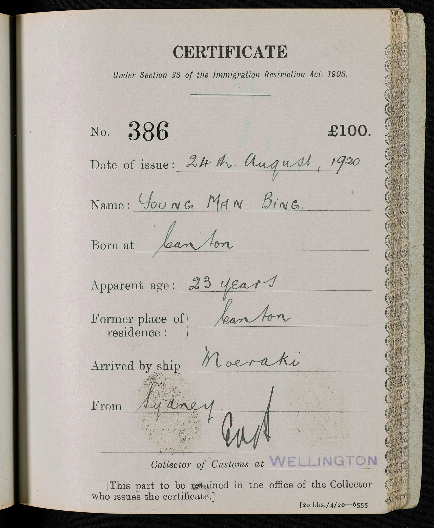 Certificate on a yellowed grey paper with handwritten text and signature