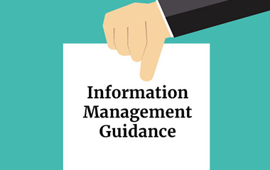 An Illustration of a hand holding a white card with words Information Management Guidance written on it, the card is on a team background