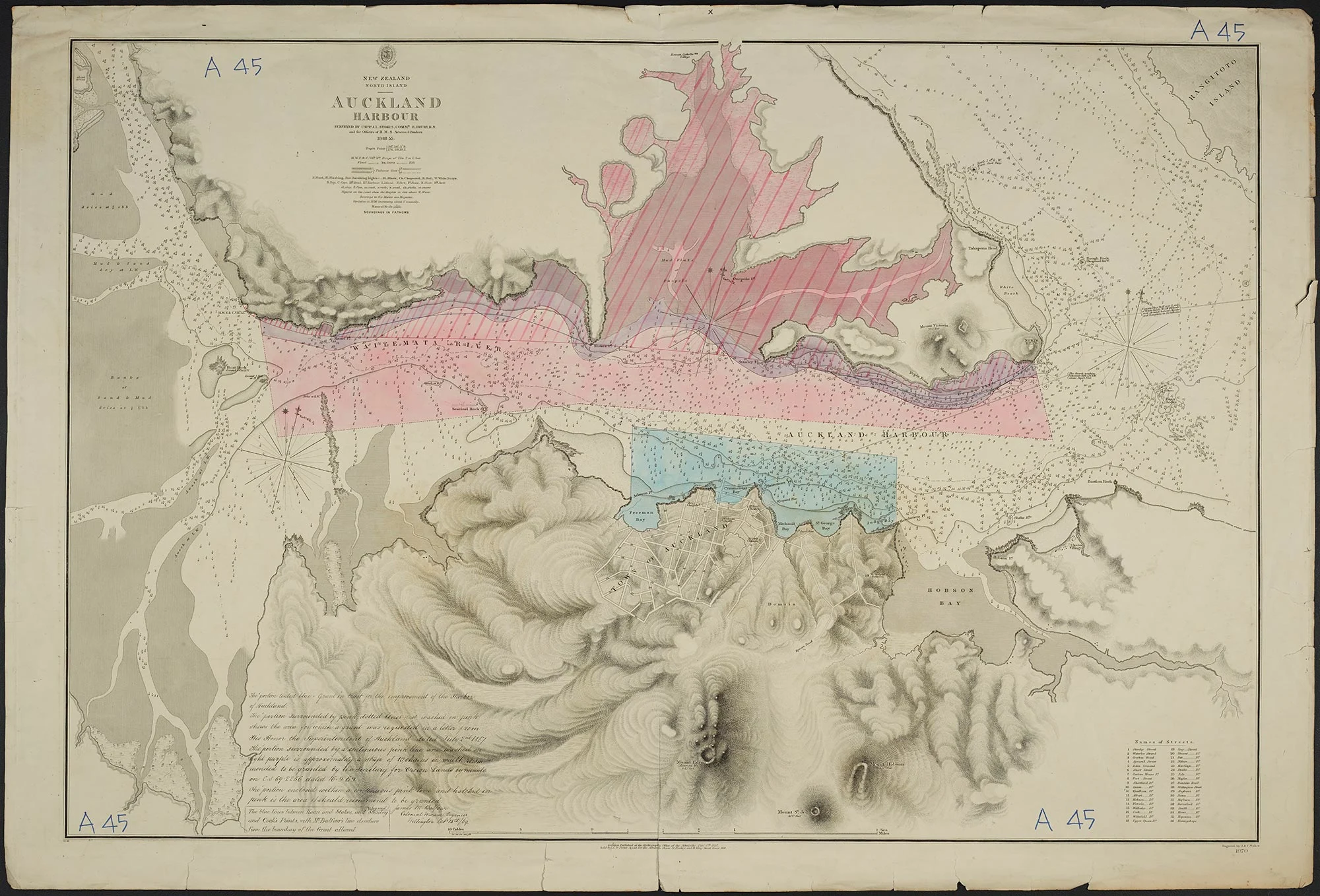 A detailed map with pink and blue coloured sections. The map is titled ‘New Zealand North Island Auckland Harbour’.