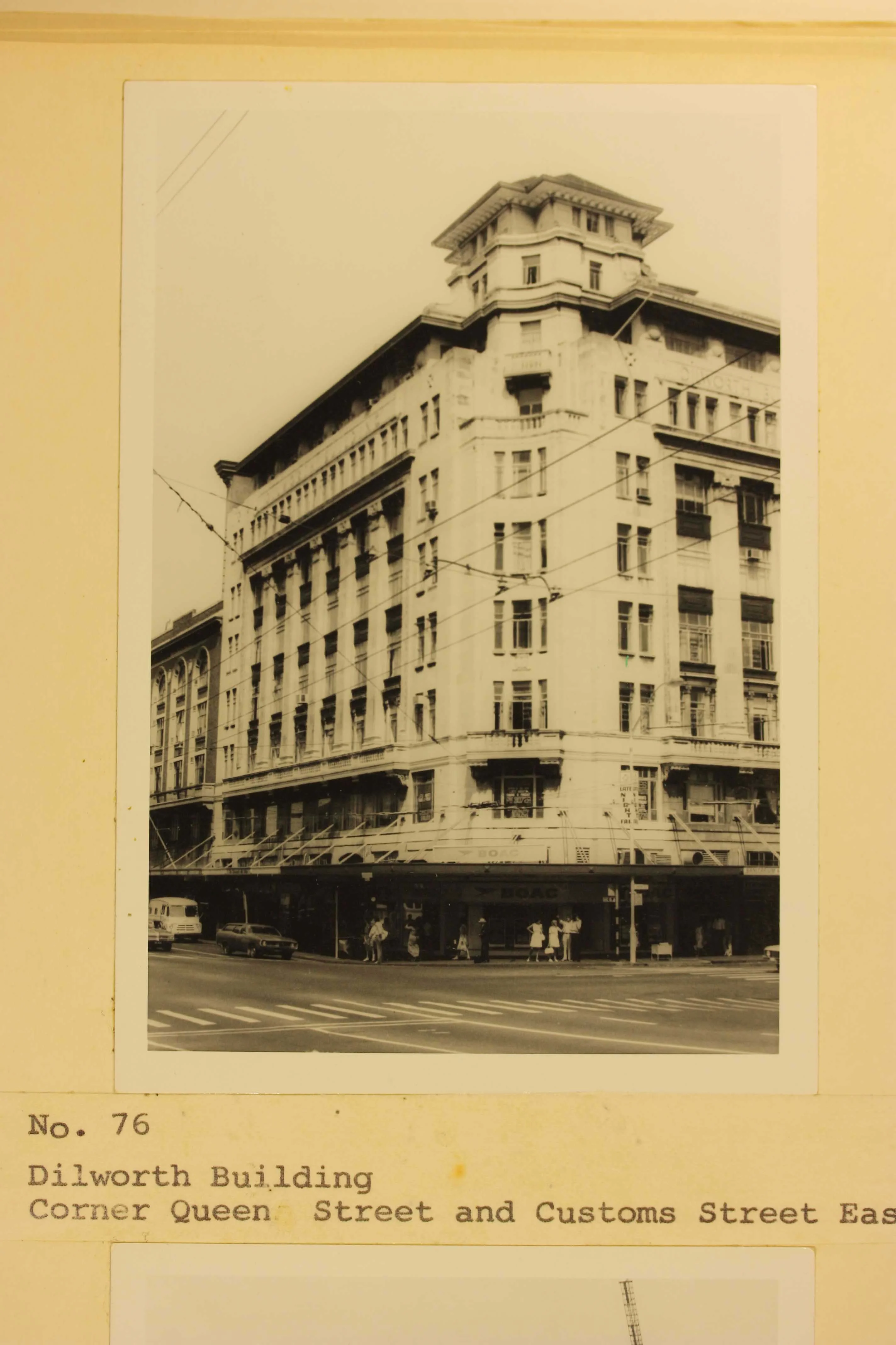 Sepia photo showing the corner of a building from the street