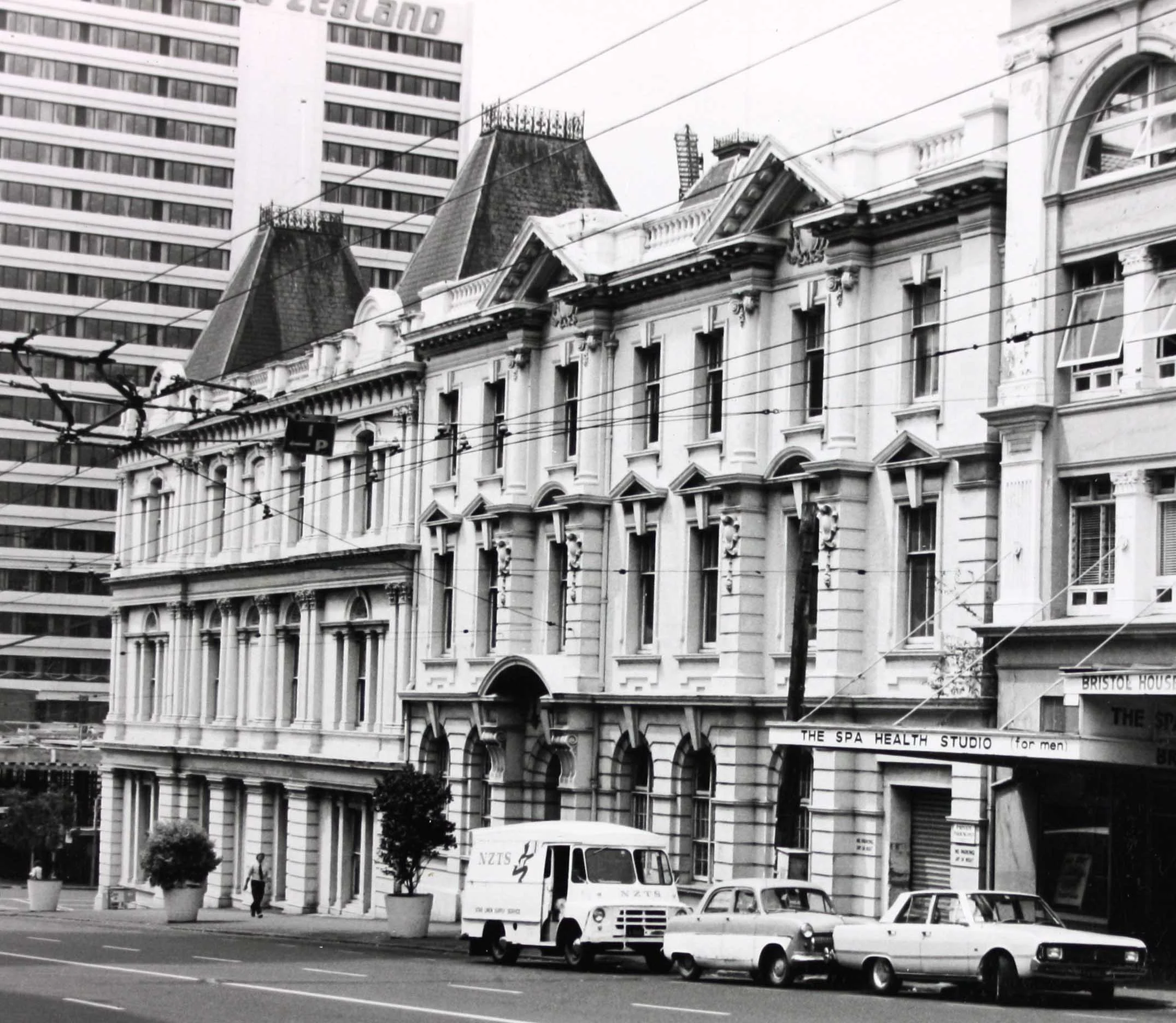 Black and white photo of a building from the street
