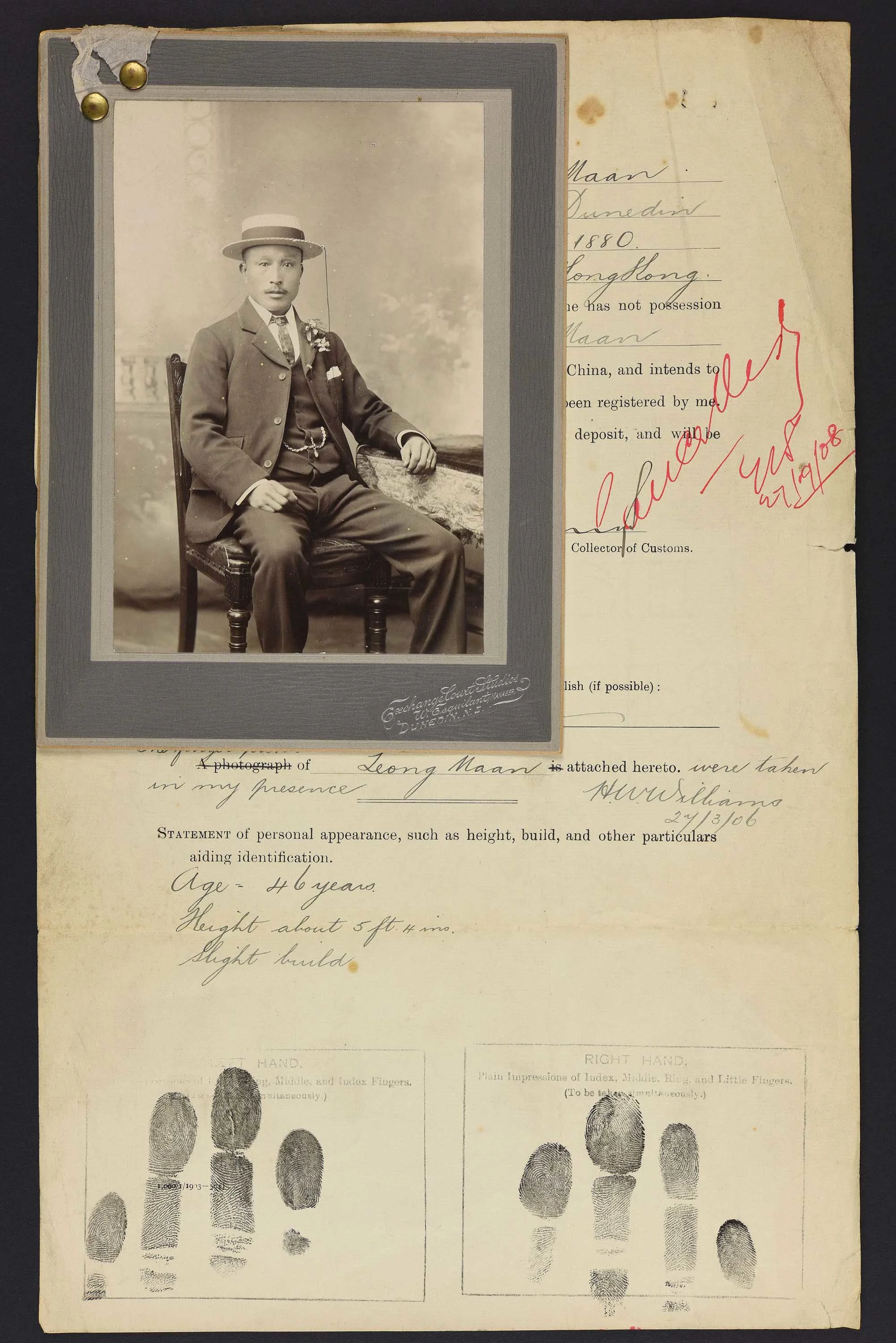 Sepia photo of a seated Chinese man in a hat attached to his immigration papers.