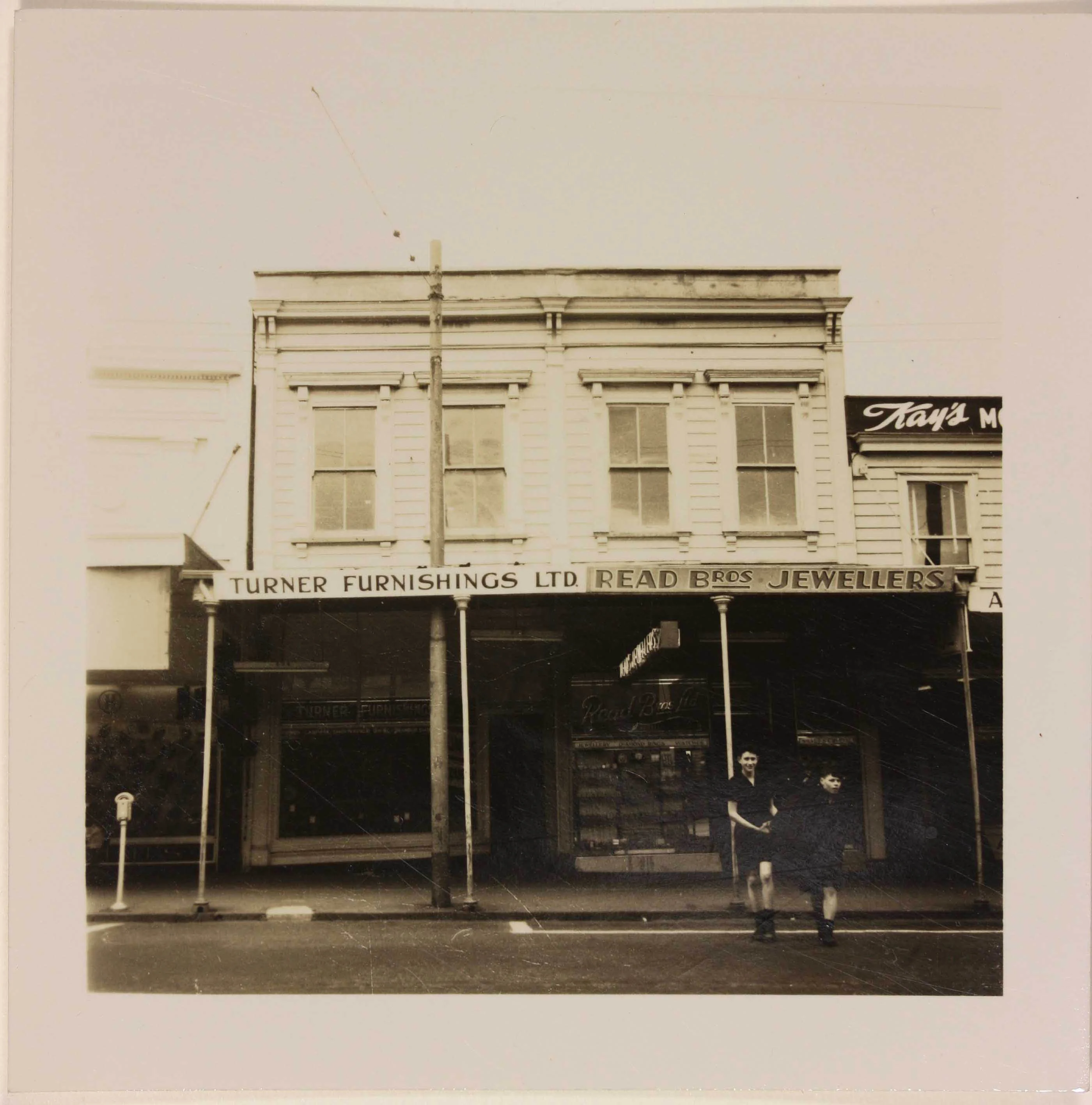 Sepia photo of a building from the street