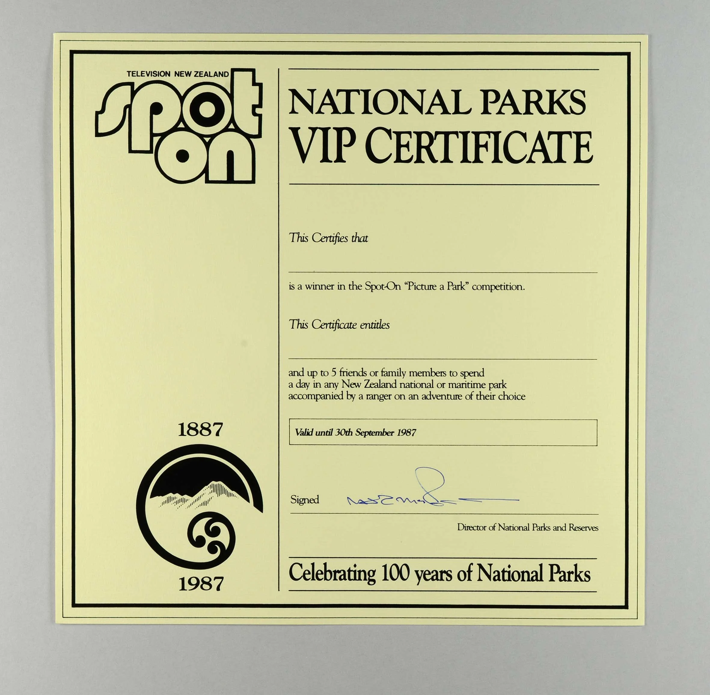 A certificate on a yellow paper with words 'Spot on' and 'National parks VIP certifcate'