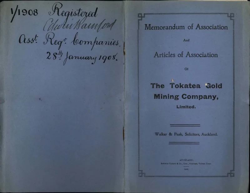 The front and back of a blue book "Memorandum of Association and Articles of Association of The Tokatea Gold Mining Company Limited. Walker and Peak, Solicitors, Auckland"